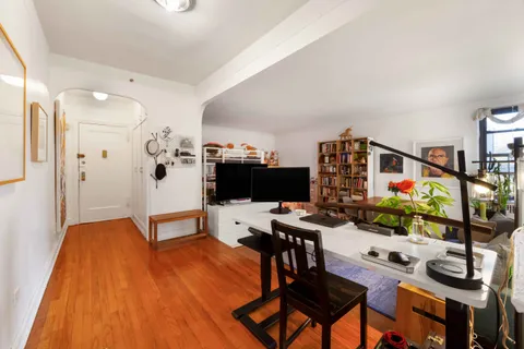 a workspace with furniture and rug