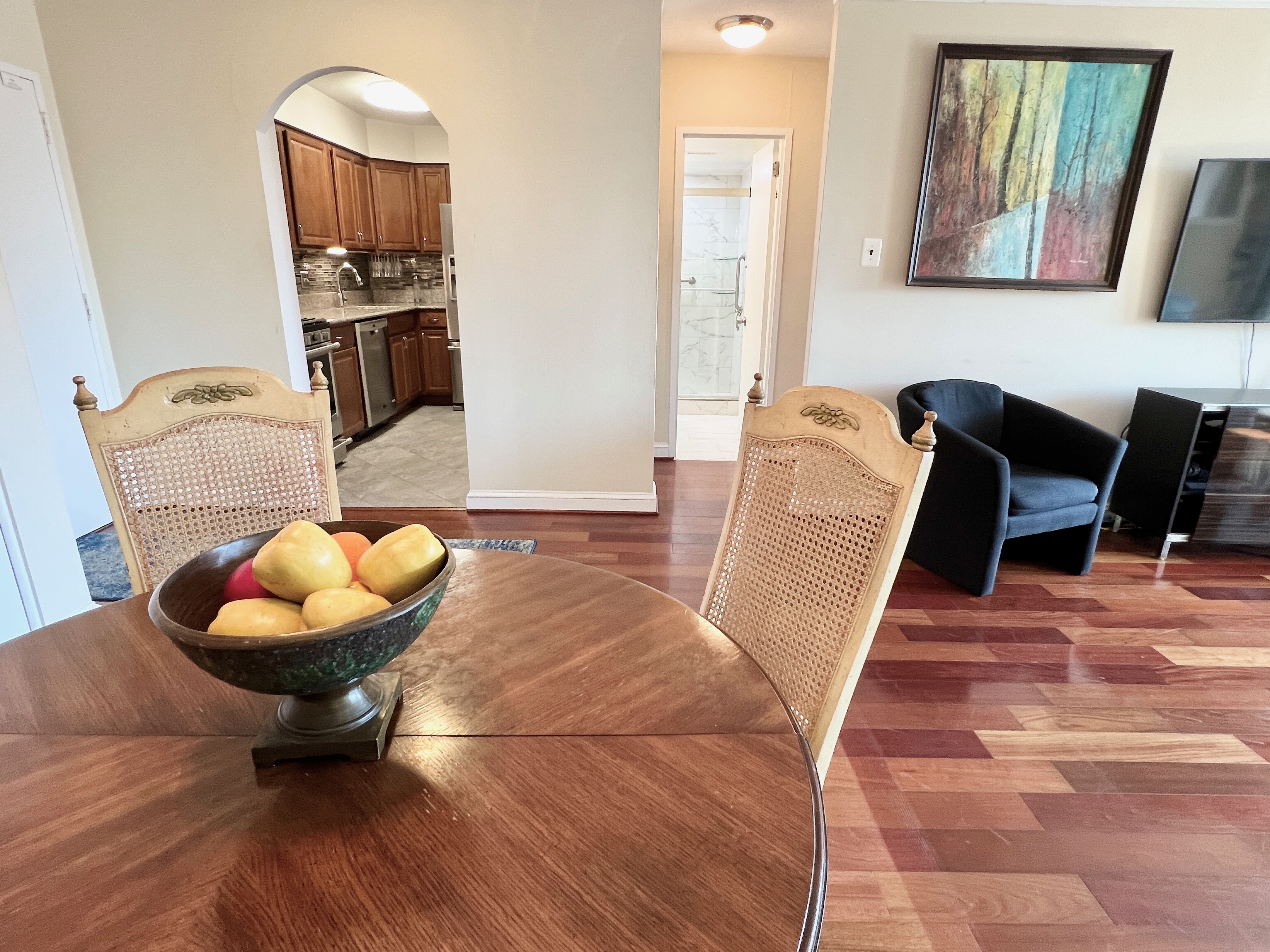 490 M Street Southwest, Unit W304 Washington, DC 20024 - Photo 10 of 36 a living room with furniture and wooden floor