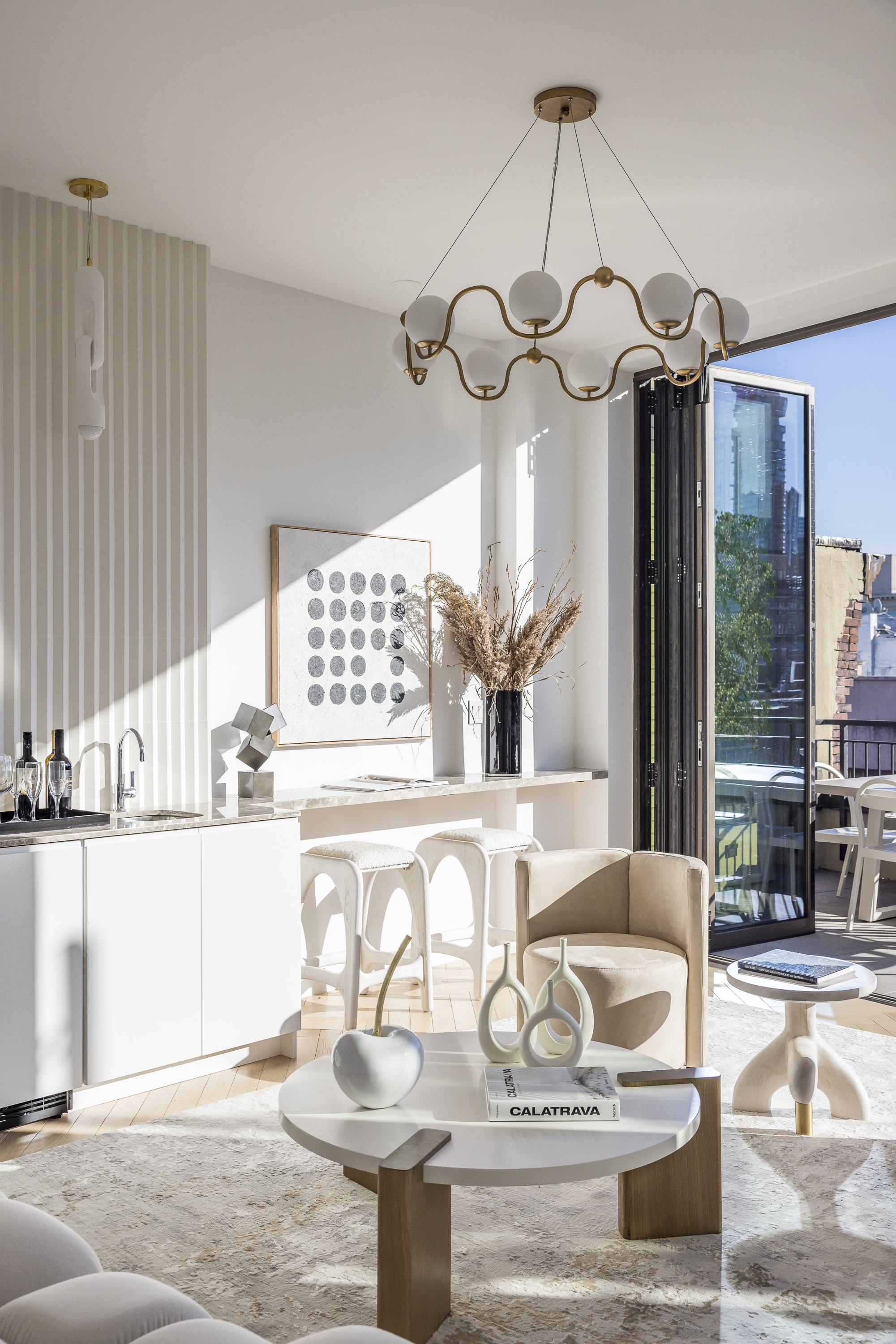 378 Broome Street, Unit PH Manhattan, NY 10013 - Photo 7 of 25 a view of a dining room with furniture a chandelier and large windows