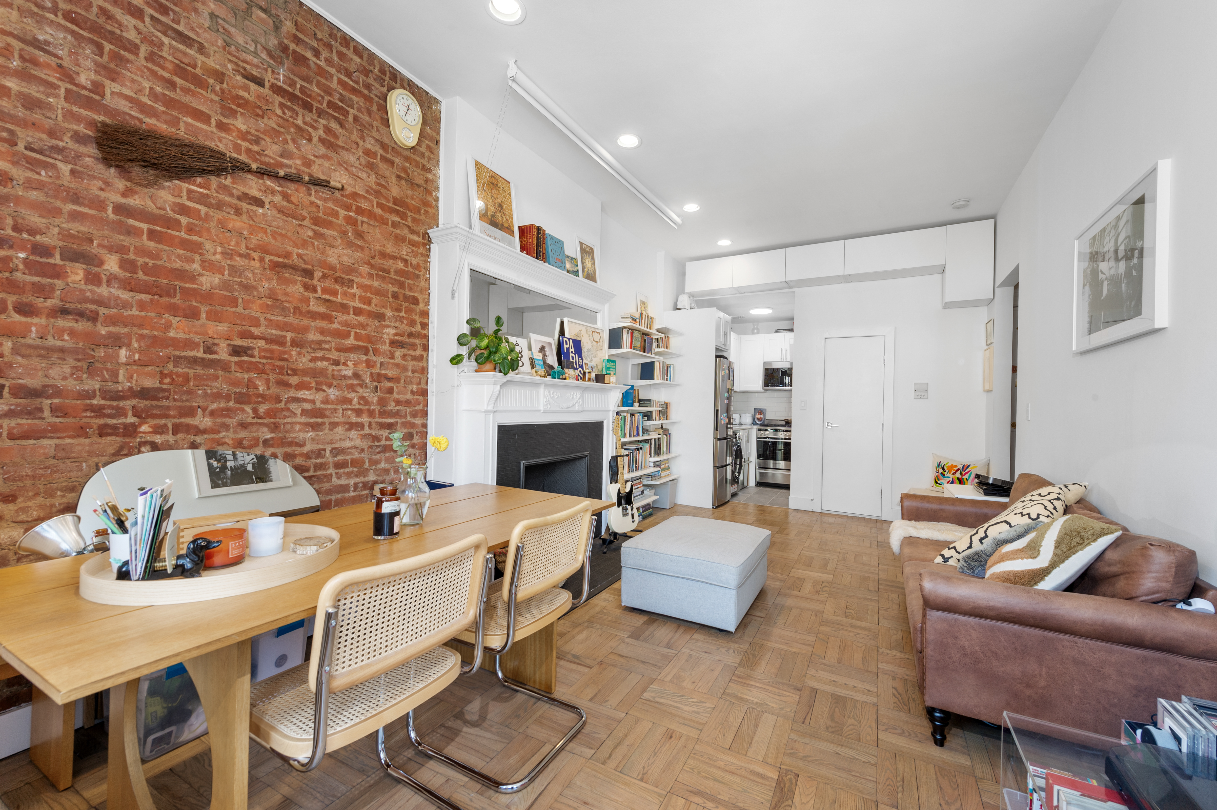 122 West 80th Street, Unit 3F Manhattan, NY 10024 - Photo 8 of 15 a living room with furniture and a fireplace