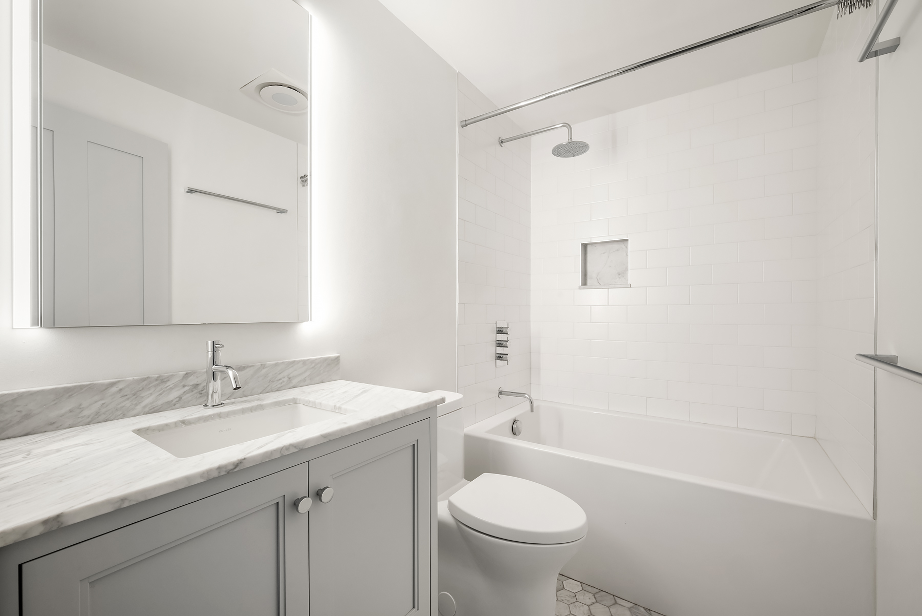 142 6th Avenue, Unit 1 Brooklyn, NY 11217 - Photo 6 of 14 a bathroom with a sink a toilet and shower