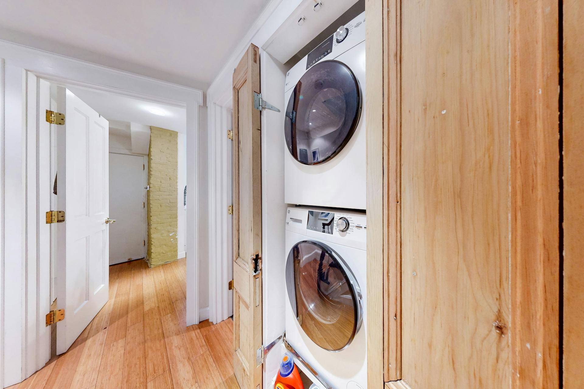 11 Fayette Street, Unit 1 Boston, MA 02116 - Photo 22 of 33 a view of a hallway with washer and dryer