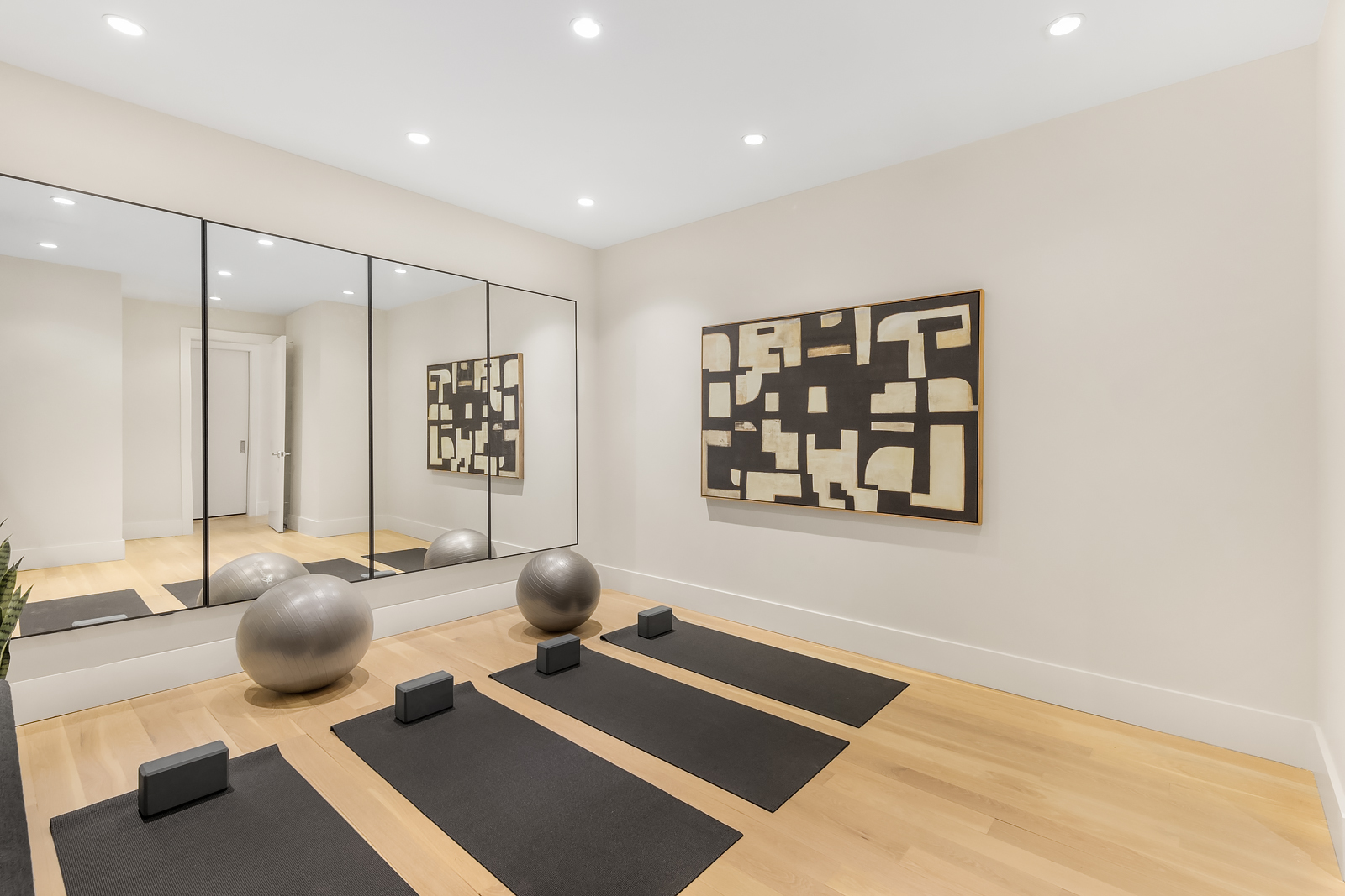 114 Liberty Street, Unit 7 Manhattan, NY 10006 - Photo 14 of 15 a living room with furniture and wooden floor