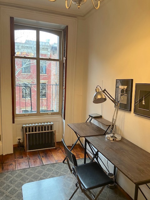 214 East 12th Street, Unit 4 Manhattan, NY 10003 - Photo 3 of 9 a view of a workspace with furniture and a window