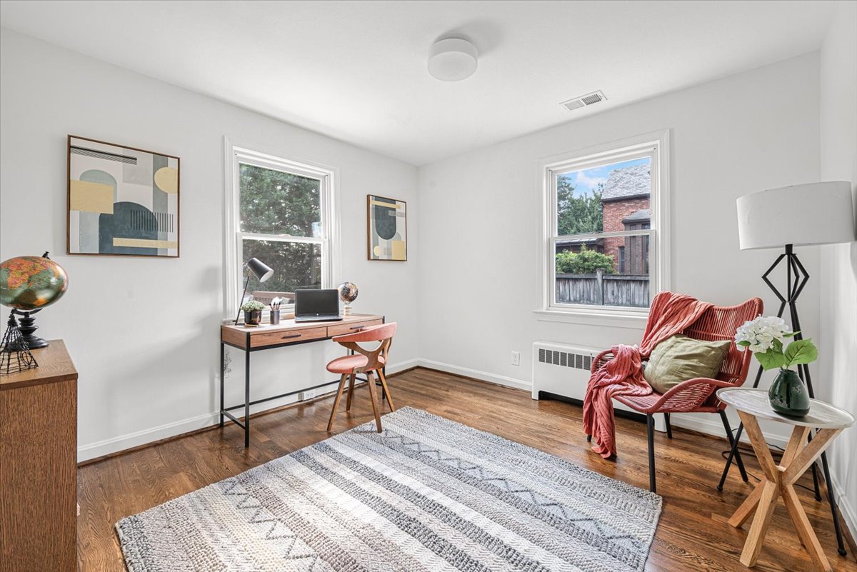 1902 Rookwood Road Silver Spring, MD 20910 - Photo 19 of 36 a living room with furniture a rug and a window
