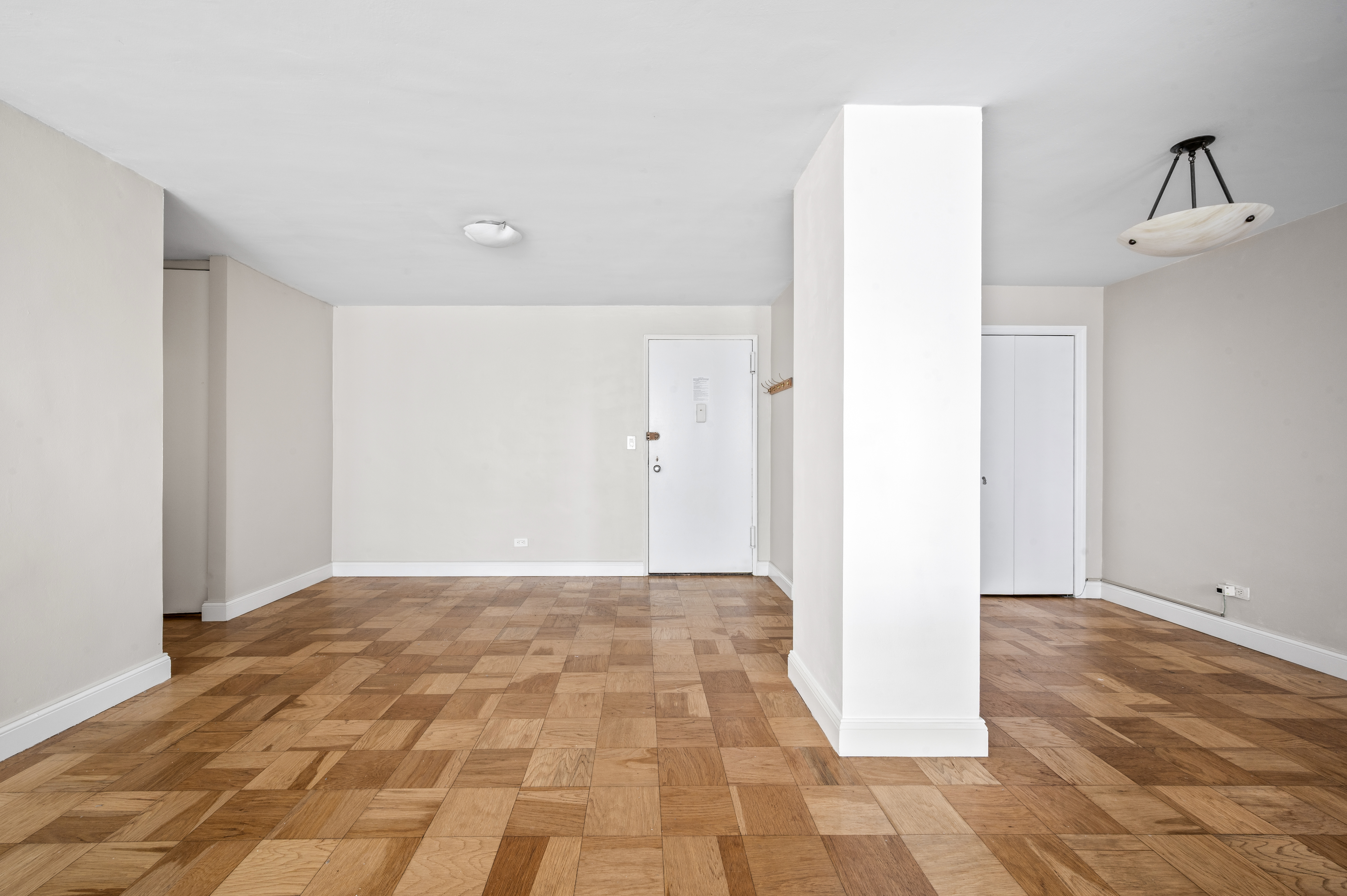 77 7th Avenue, Unit 10N Manhattan, NY 10011 - Photo 7 of 13 a view of an empty room