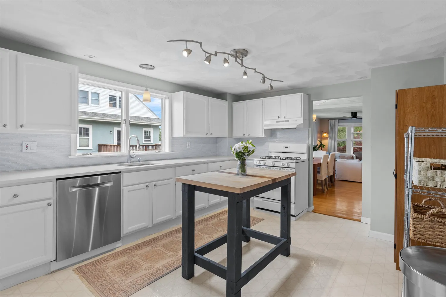 a kitchen that has a cabinets and a refrigerator