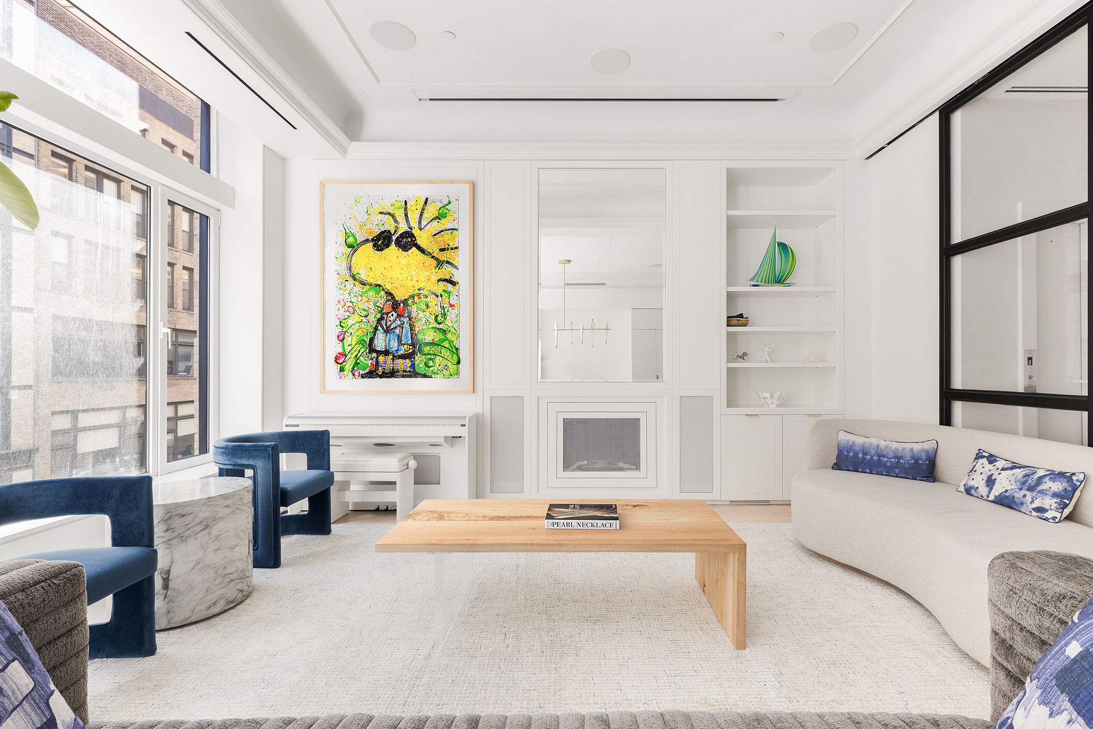 26 West 20th Street, Unit 3 Manhattan, NY 10011 - Photo 2 of 19 a living room with furniture and a large window