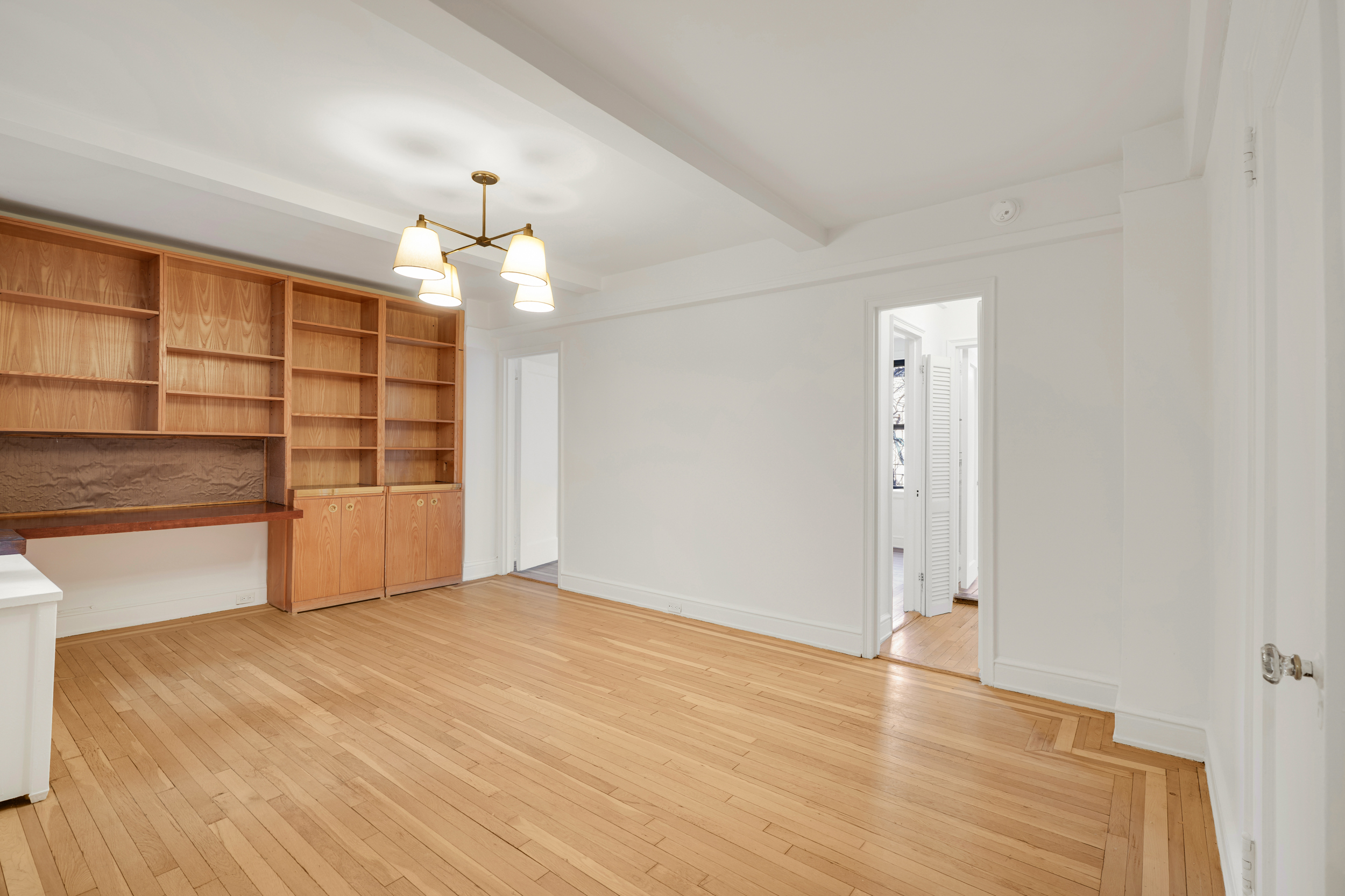 74 West 68th Street, Unit 5A Manhattan, NY 10023 - Photo 16 of 25 a view of an empty room with a window
