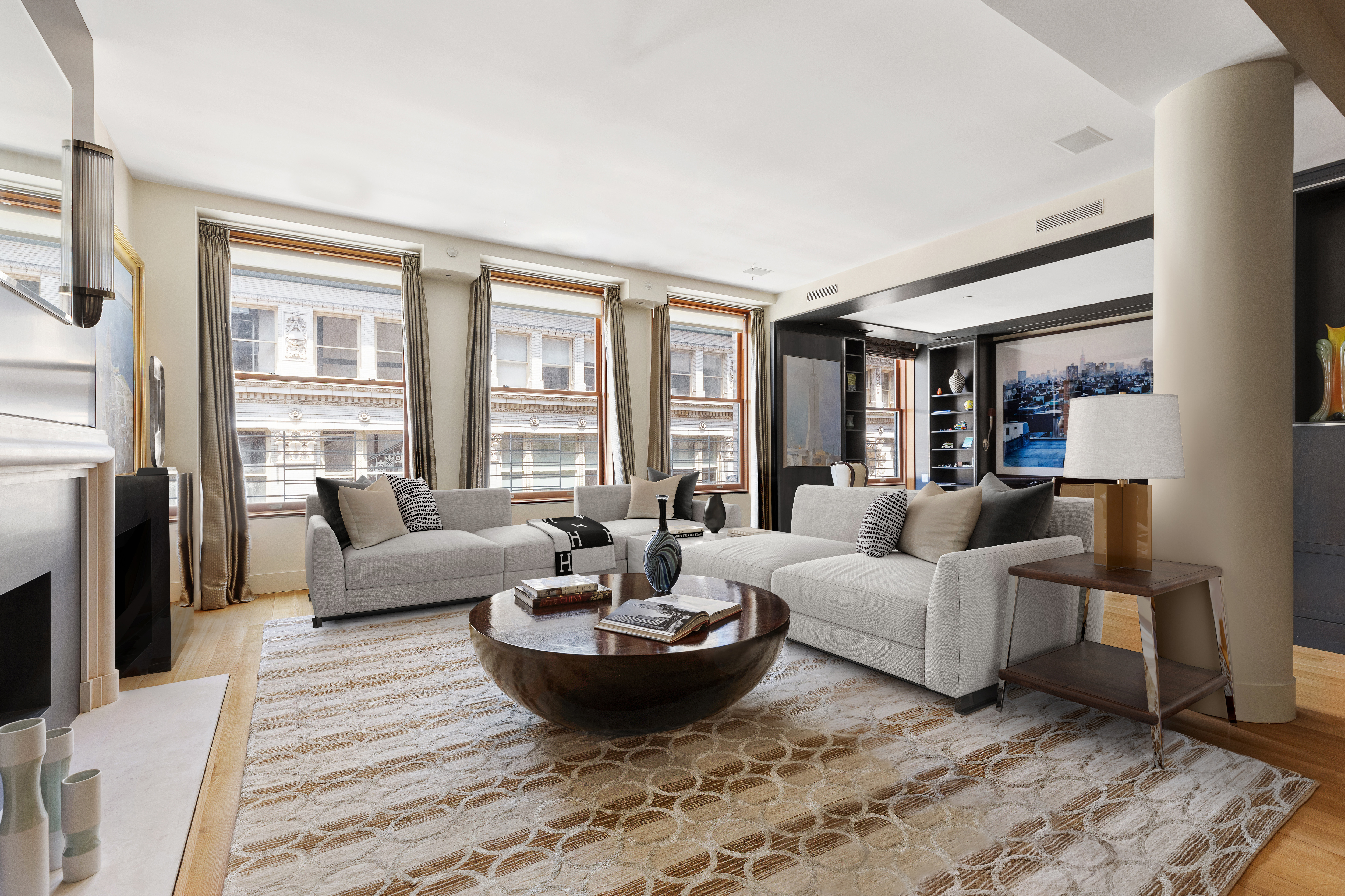 32 West 18th Street, Unit 7B Manhattan, NY 10011 - Photo 2 of 19 a living room with furniture and a large window