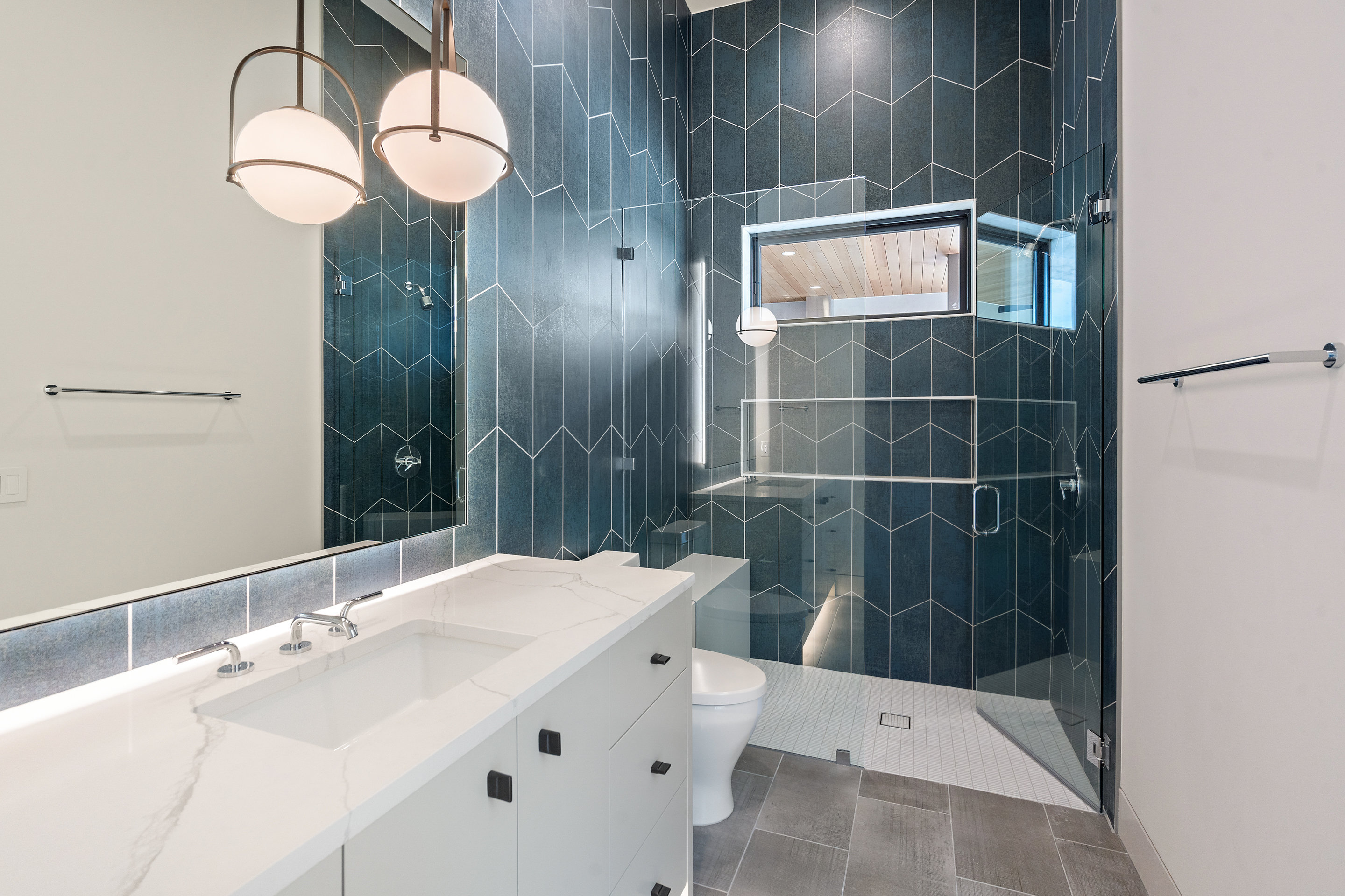 1905 Hallam Drive Austin, TX 78746 - Photo 27 of 39 a bathroom with a sink and a mirror