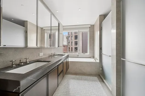 a kitchen with a sink and a refrigerator