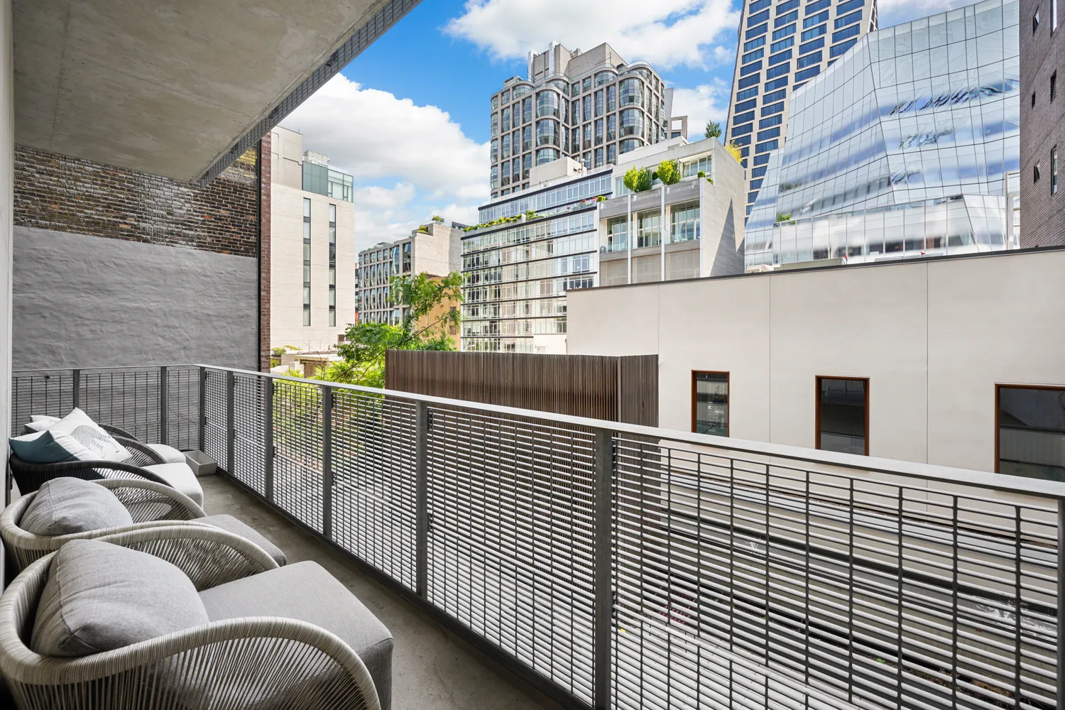 a view of balcony with furniture