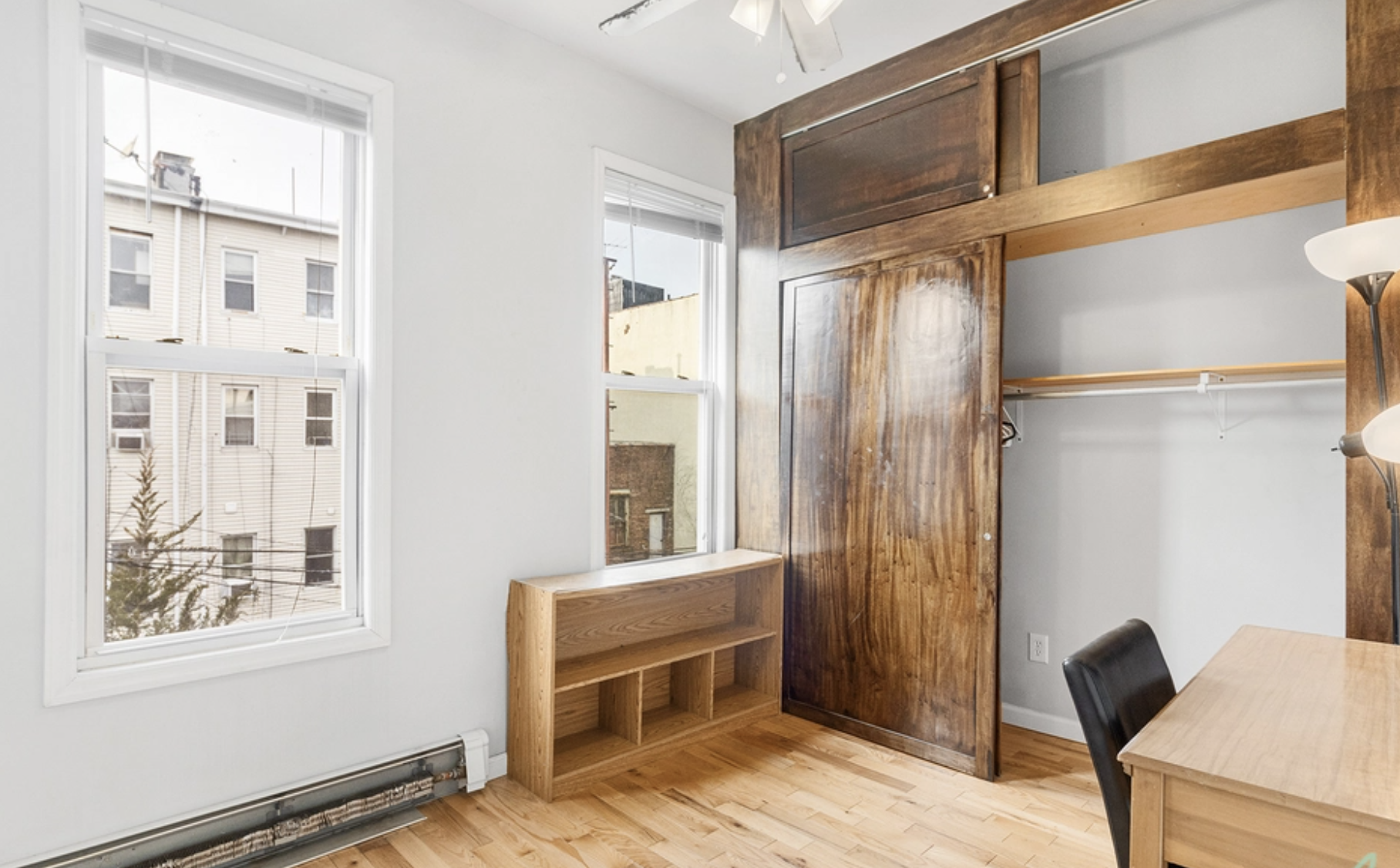 22-18 41st Street, Unit 2R Queens, NY 11105 - Photo 6 of 10 a view of walk in closet with wooden floor