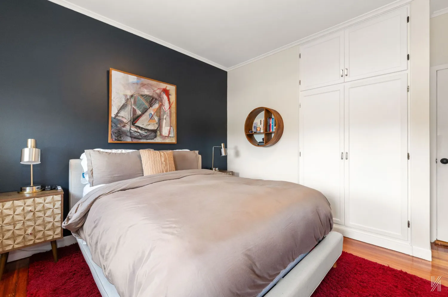 a bedroom with bed and a window