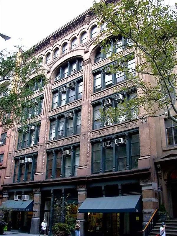 43 East 10th Street, Unit 5J Manhattan, NY 10003 - Photo 5 of 7 a large building with a lot of windows