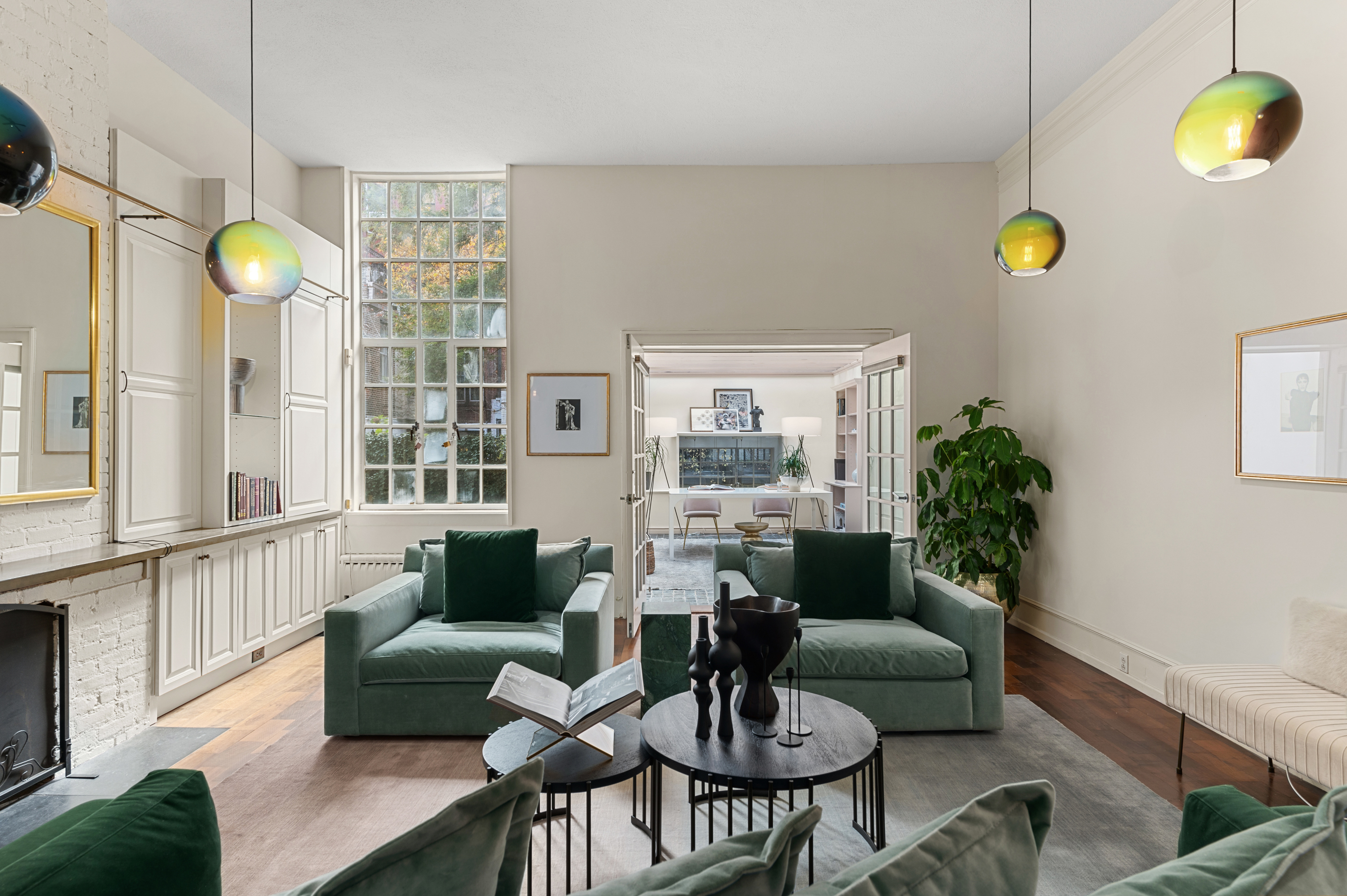126 West 78th Street Manhattan, NY 10024 - Photo 4 of 39 a living room with furniture and a window