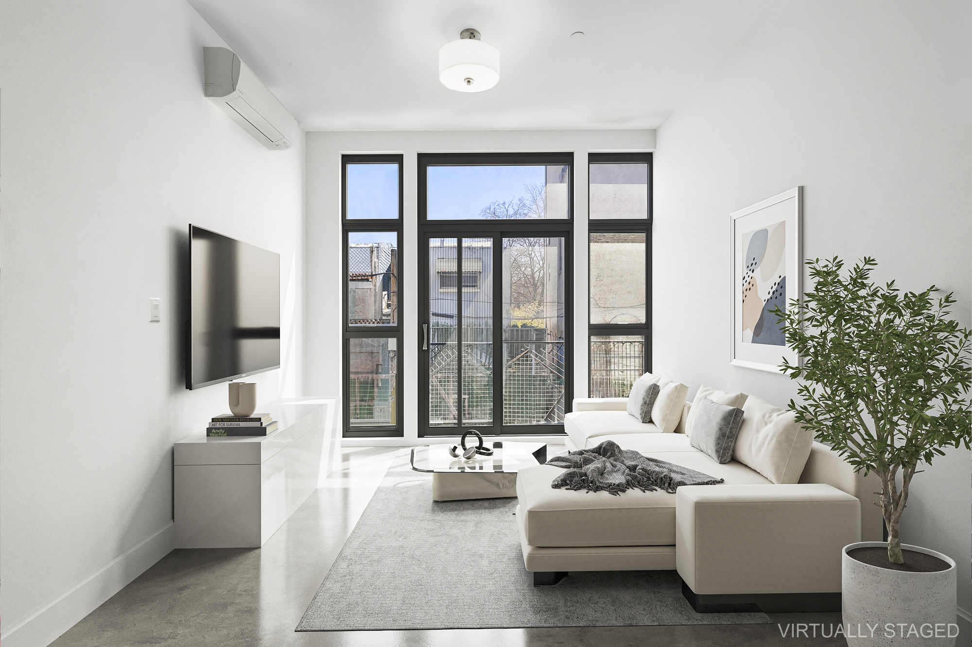 30 Belvidere Street, Unit 2B Brooklyn, NY 11206 - Photo 2 of 7 a living room with furniture and a large window