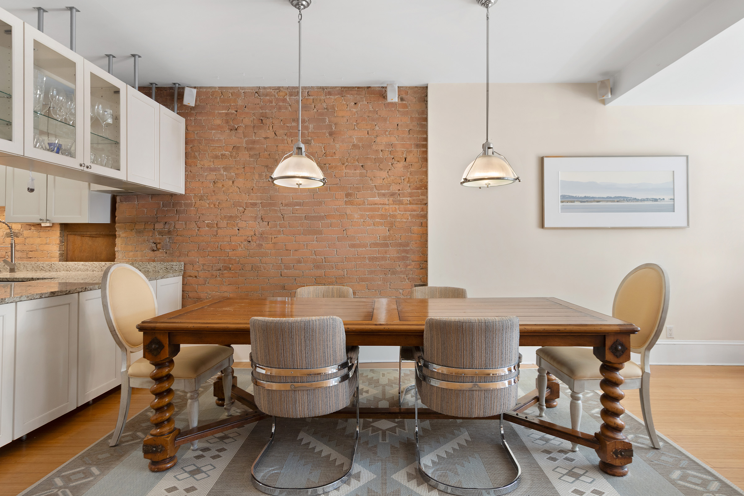 216 East 75th Street, Unit 3EAST Manhattan, NY 10021 - Photo 4 of 9 a dining room with furniture and wooden floor