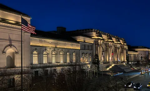 a view of building with outdoor seating