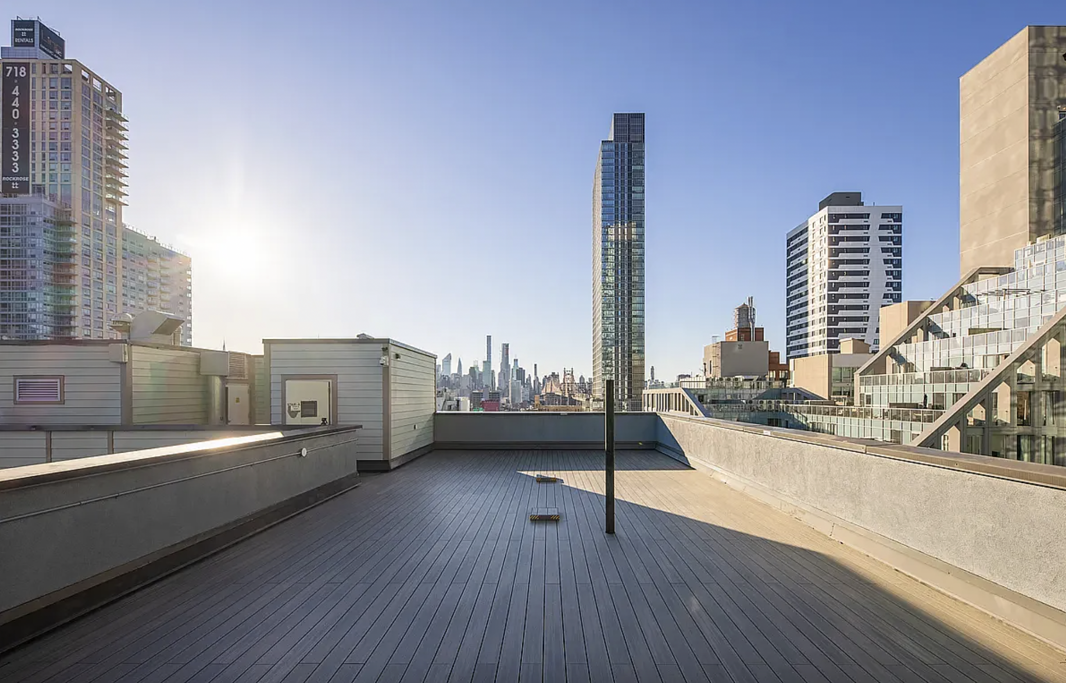 42-37 27th Street, Unit 8C Queens, NY 11101 - Photo 8 of 11 a view of an ocean with tall building