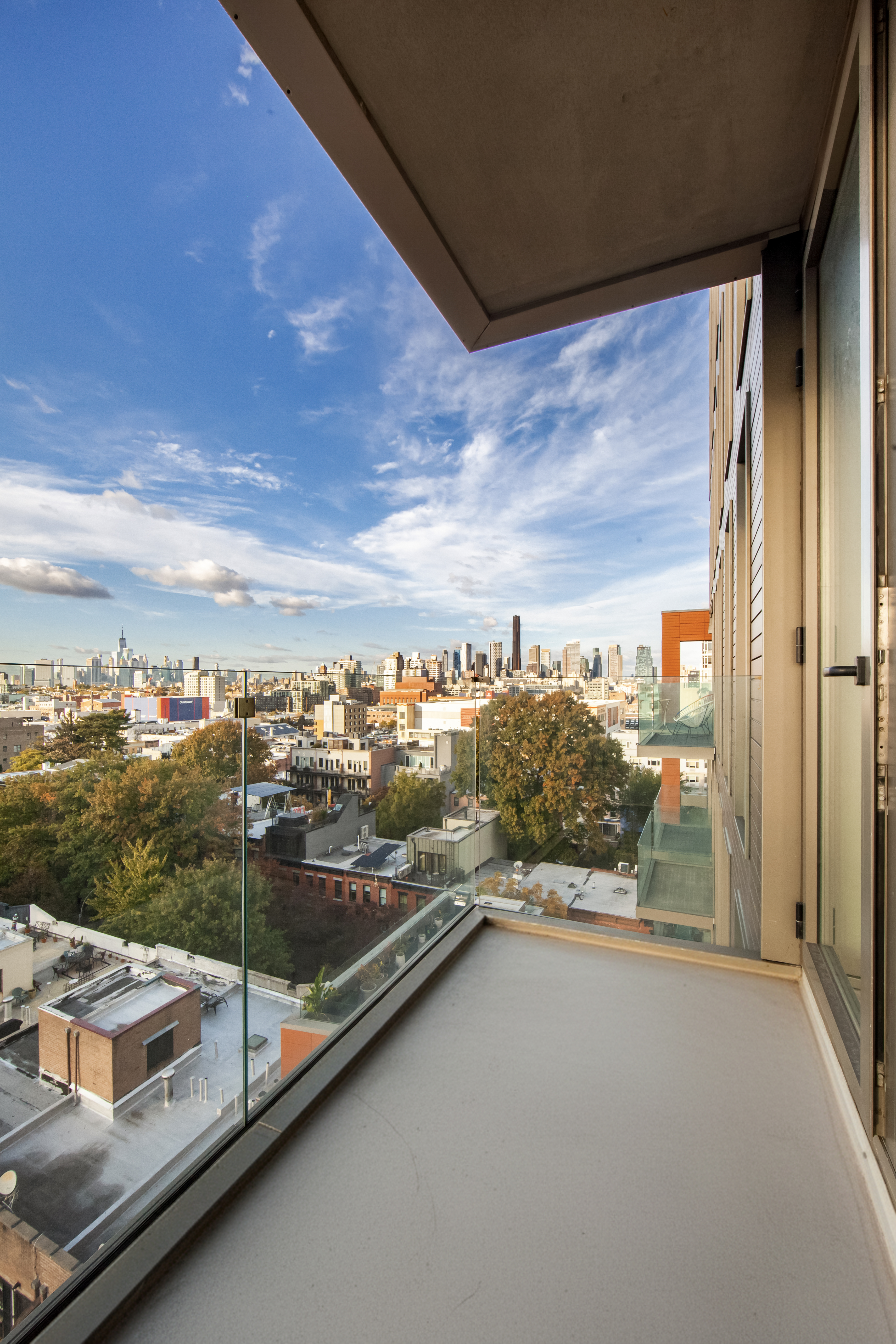202 8th Street, Unit 8B Brooklyn, NY 11215 - Photo 5 of 20 a view of a city from a balcony