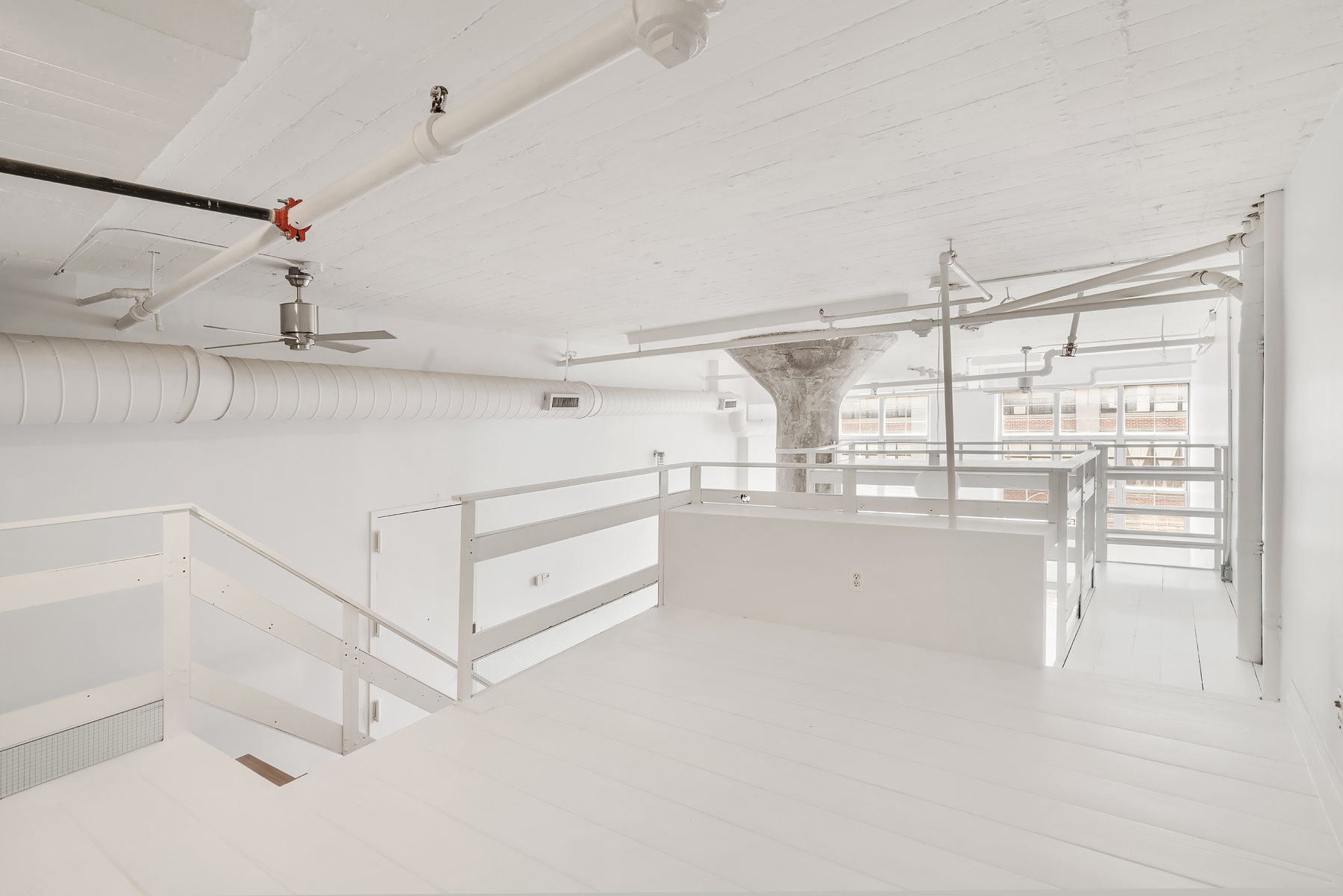 689 Myrtle Avenue, Unit 4E Brooklyn, NY 11205 - Photo 13 of 21 a view of a room with racks on the wall