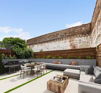 a view of roof with seating area