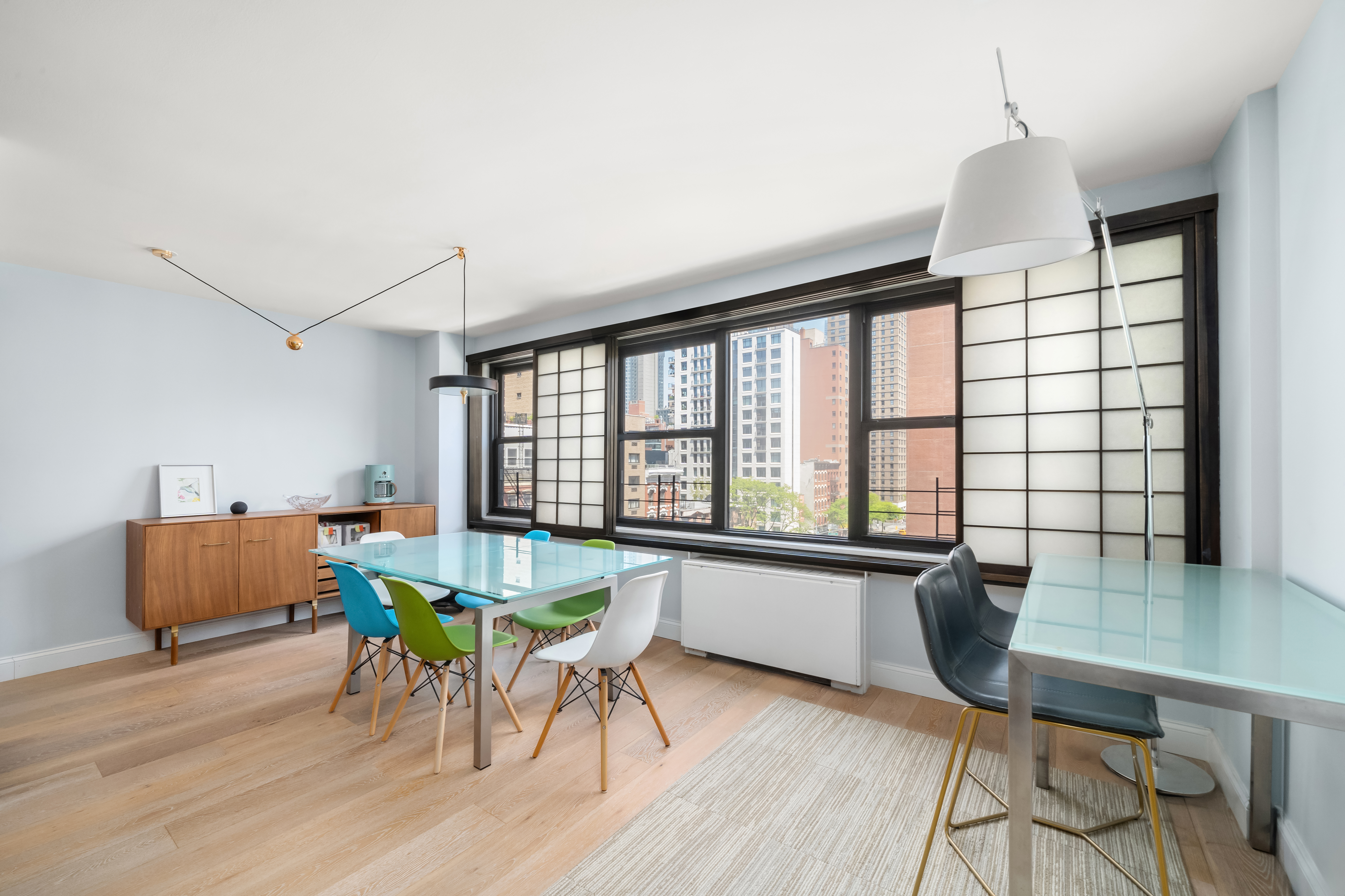 200 East 27th Street, Unit 7EF Manhattan, NY 10016 - Photo 2 of 13 a dining room with furniture and wooden floor