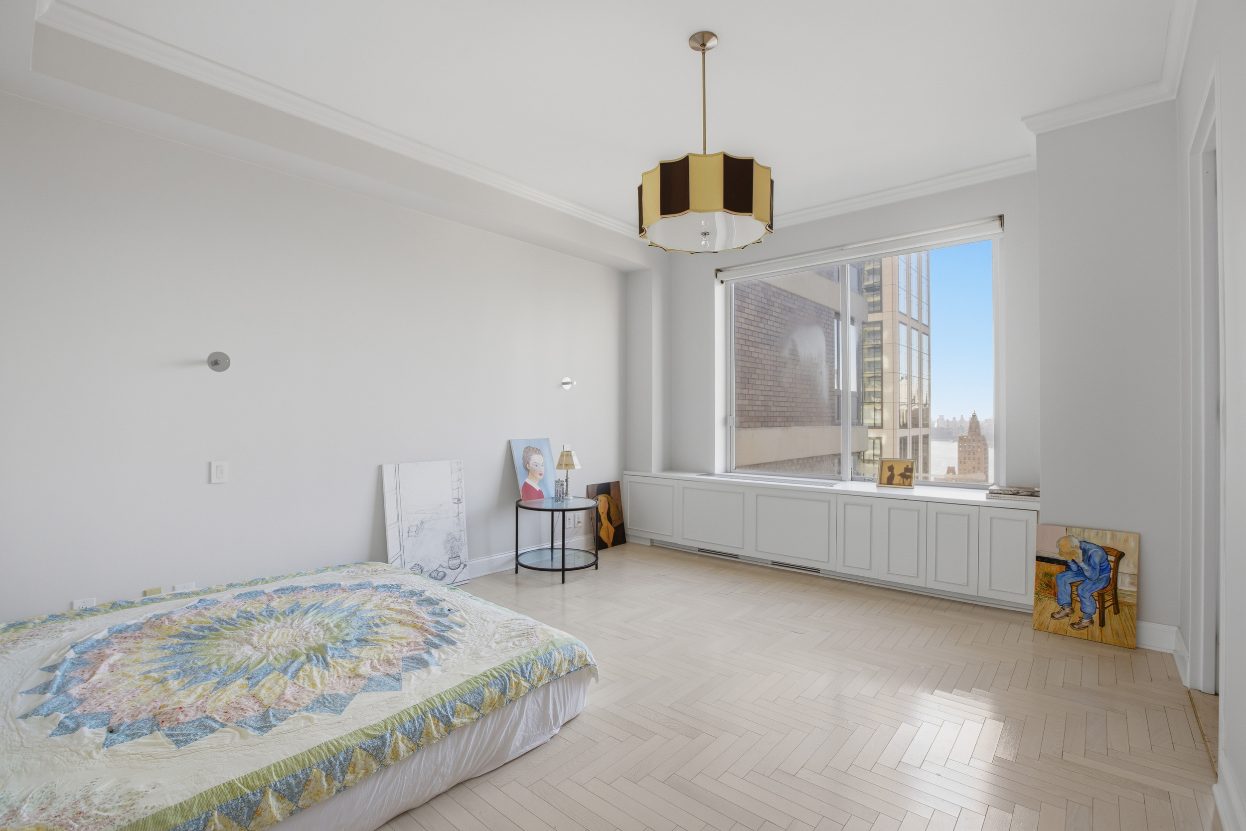 418 East 59th Street, Unit PHA Manhattan, NY 10022 - Photo 9 of 17 a very nice looking room with a bed and a window