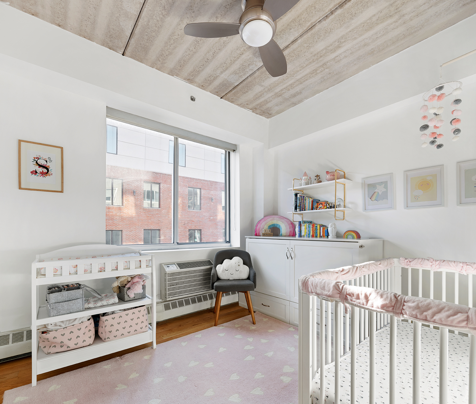 529 Court Street, Unit 204 Brooklyn, NY 11231 - Photo 4 of 9 a bedroom with furniture a flat screen tv and a window