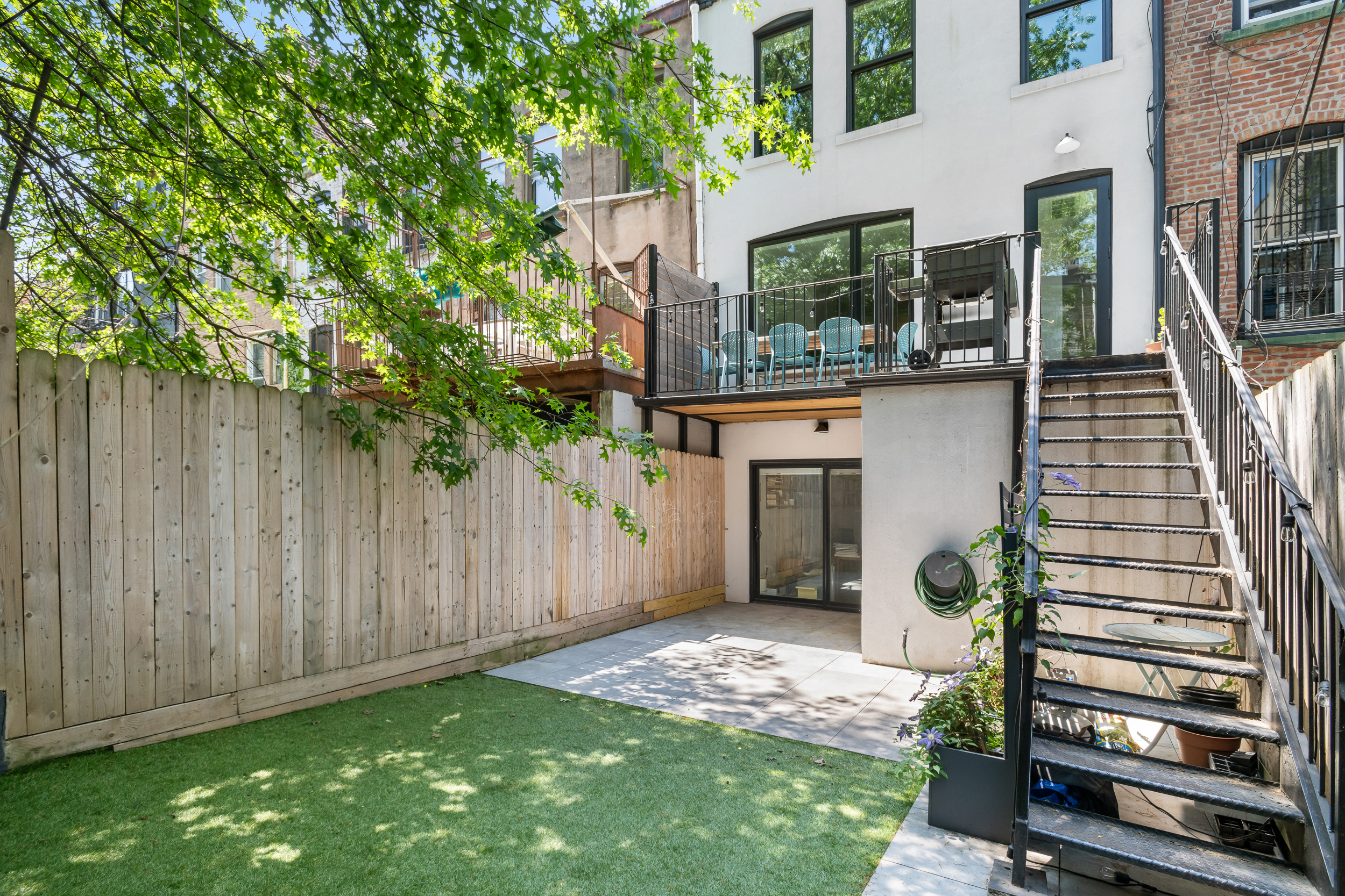 5 Hampton Place Brooklyn, NY 11213 - Photo 14 of 24 a front view of a house with garden