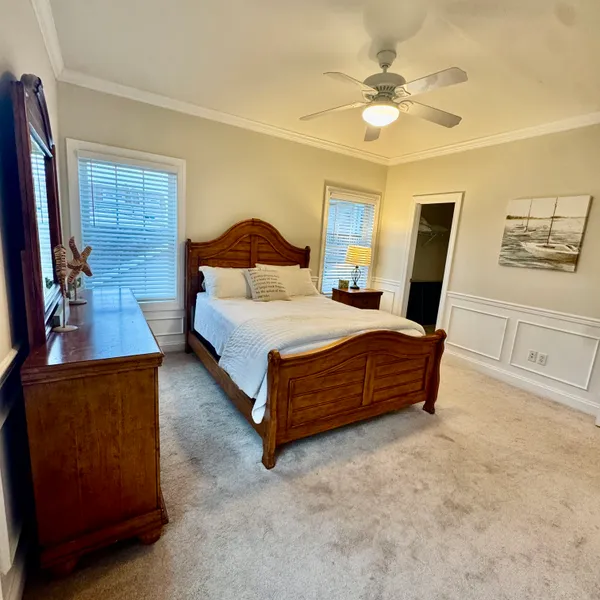 a bathroom with a toilet a sink and a mirror