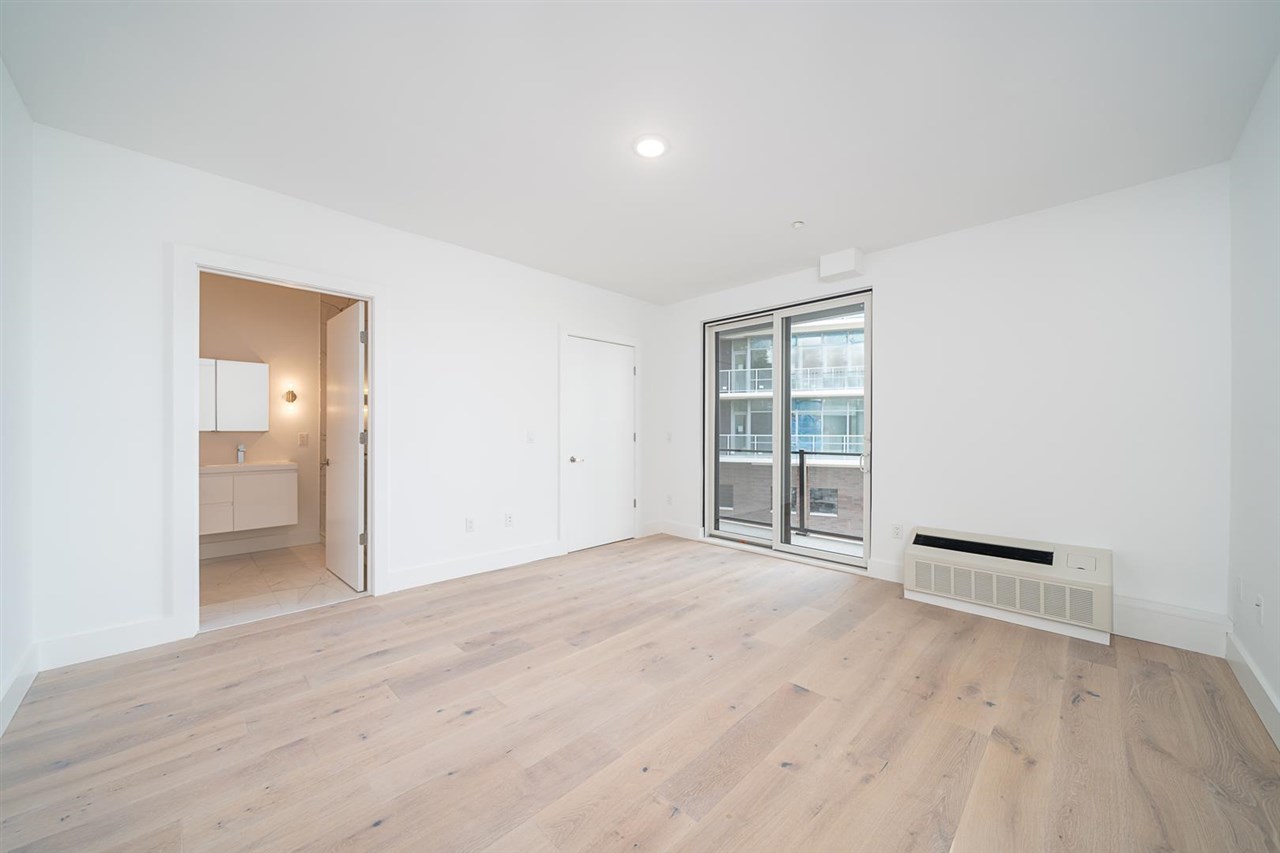 8621 River Road, Unit 6D North Bergen, NJ 07047 - Photo 14 of 36 a view of an empty room with wooden floor and a bathroom