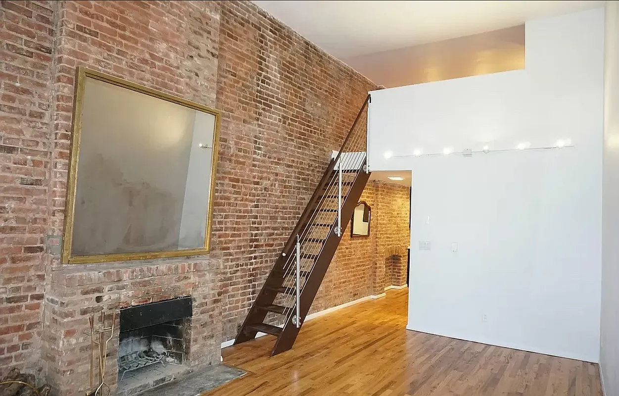 223 West 14th Street, Unit 1B Manhattan, NY 10011 - Photo 4 of 10 a view of entryway with wooden floor