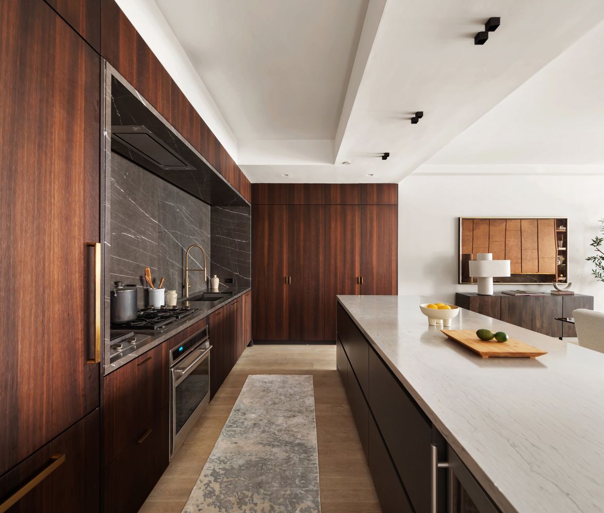 a kitchen with sink cabinets and counter top space