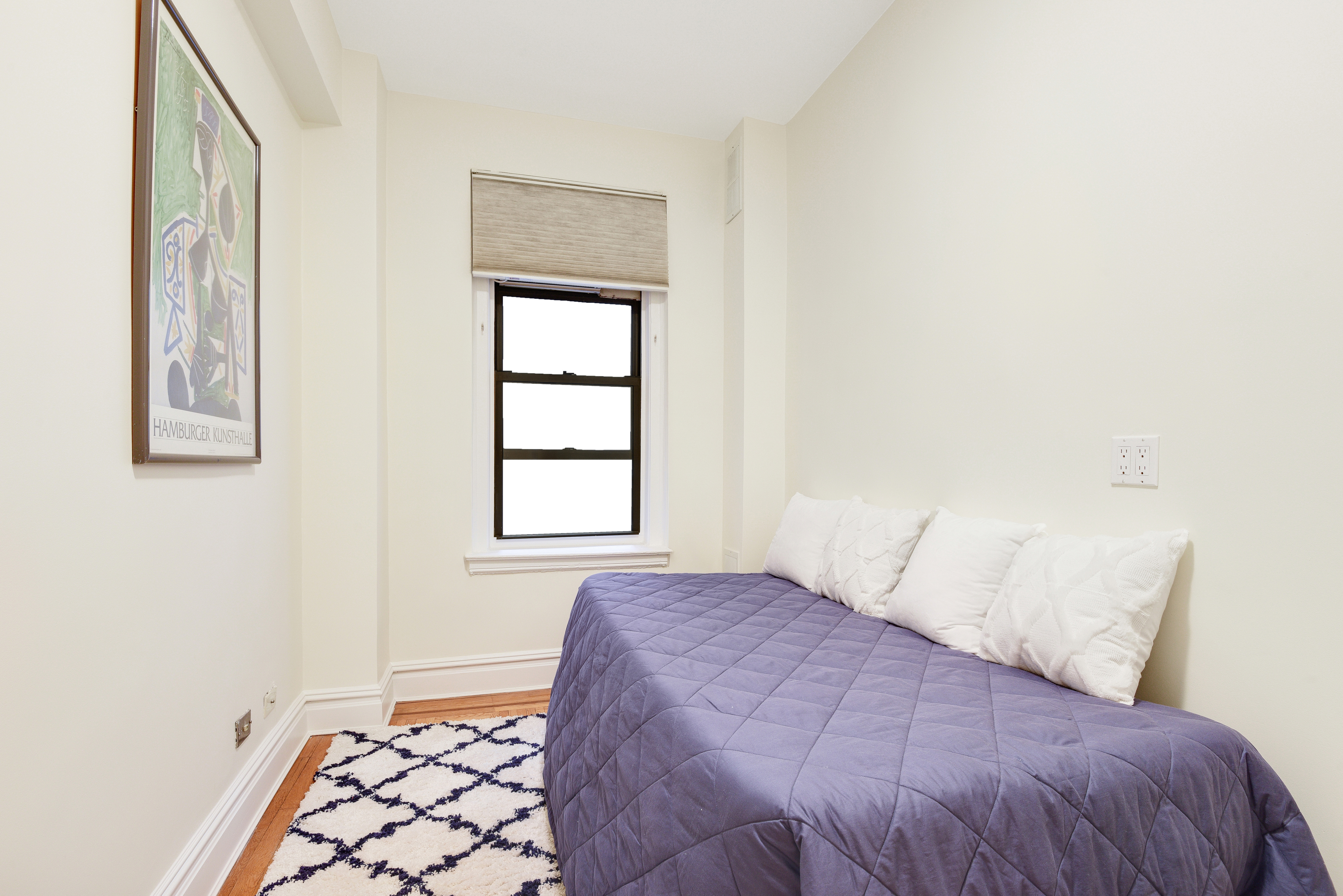 321 West 90th Street, Unit 2F Manhattan, NY 10024 - Photo 11 of 16 a bedroom with a bed and a window