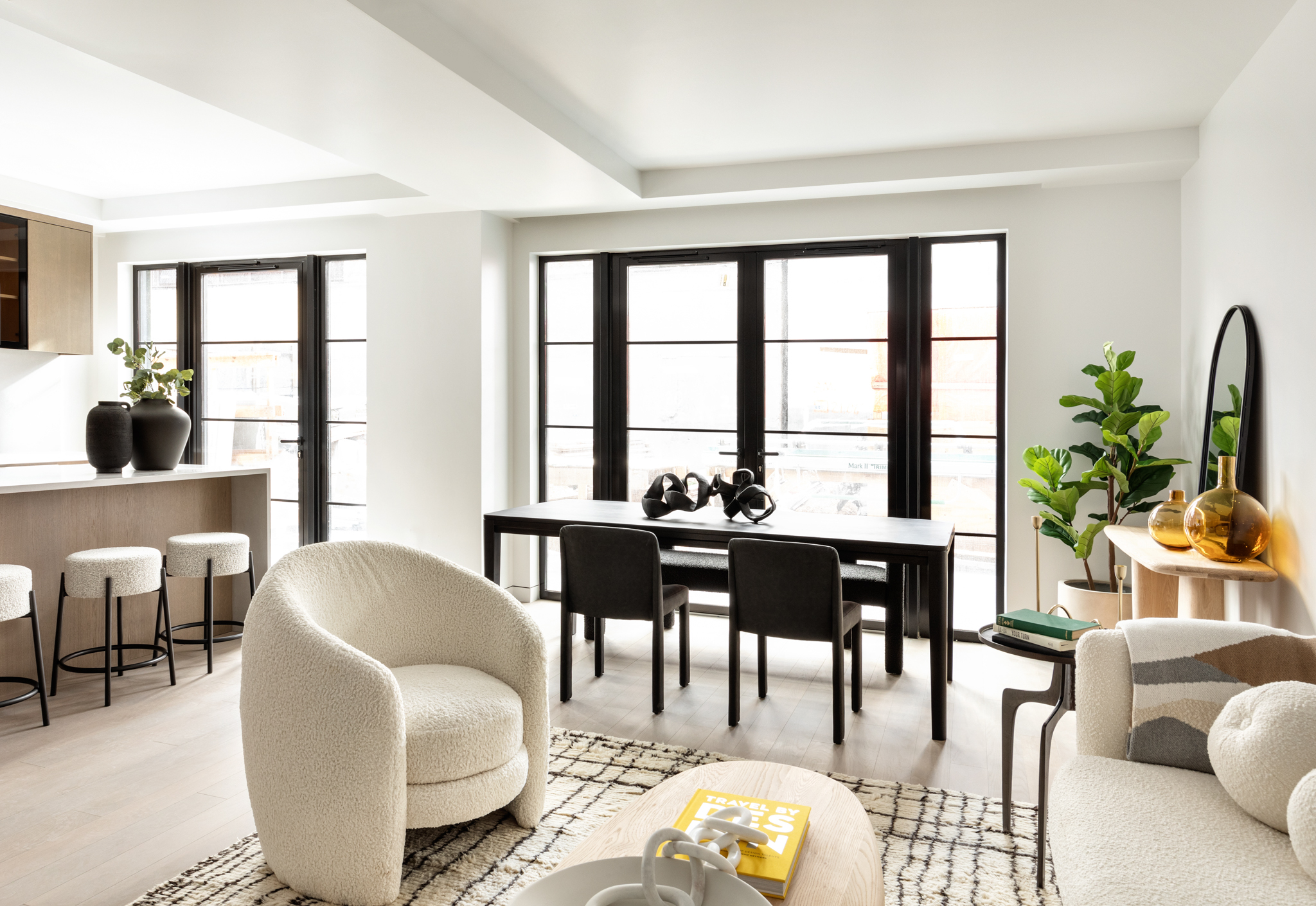 327 East 22nd Street, Unit 1A Manhattan, NY 10010 - Photo 6 of 11 a living room with furniture a potted plant and a large window