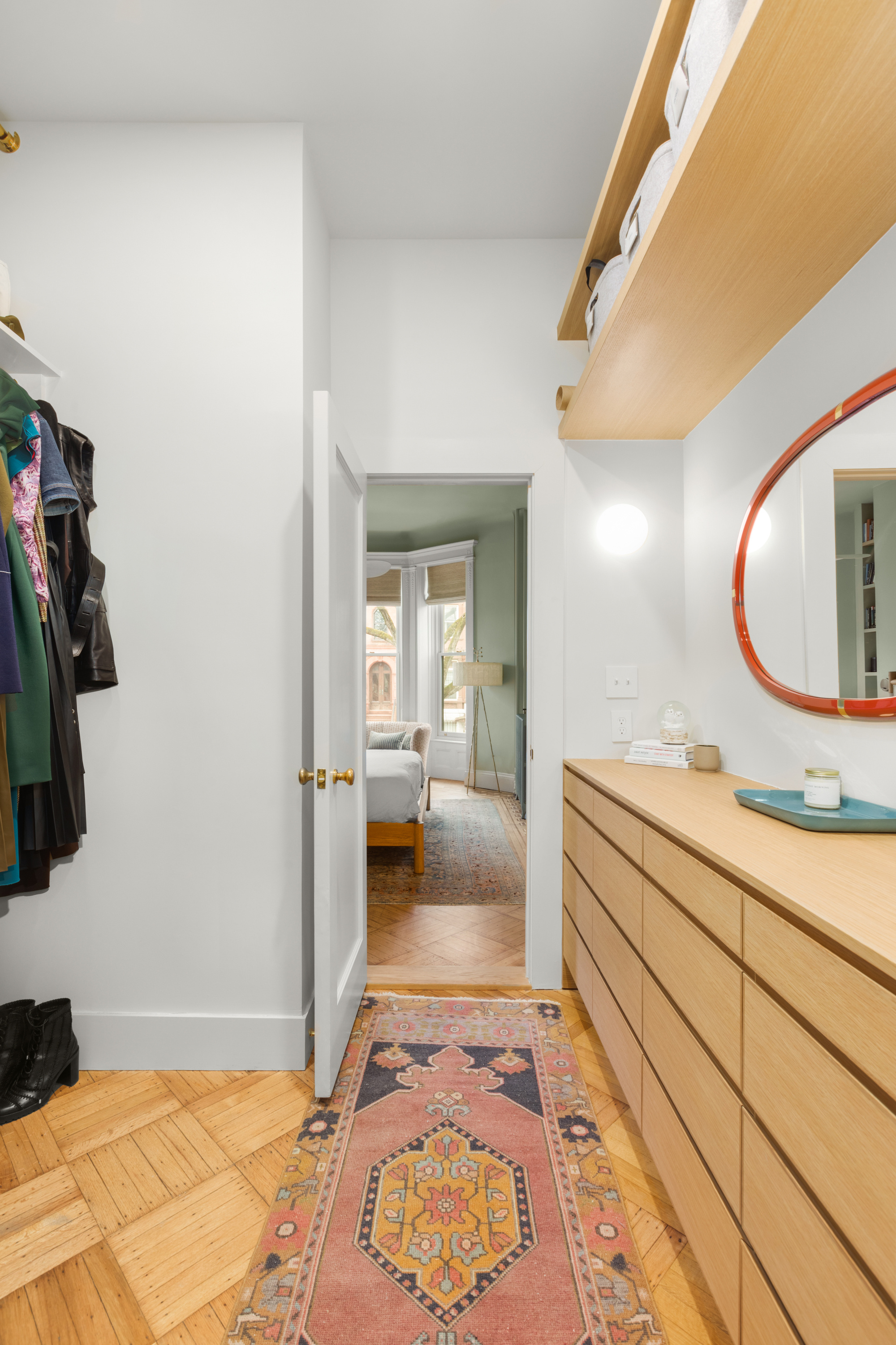 152 Underhill Avenue Brooklyn, NY 11238 - Photo 13 of 20 a spacious bathroom with a sink and a mirror