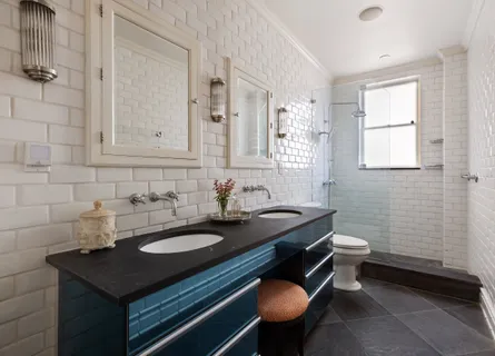 a bathroom with a sink toilet and vanity