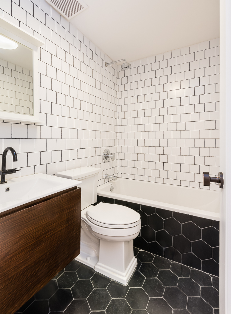 237 Macon Street, Unit 1 Brooklyn, NY 11216 - Photo 7 of 9 a bathroom with a sink toilet and shower