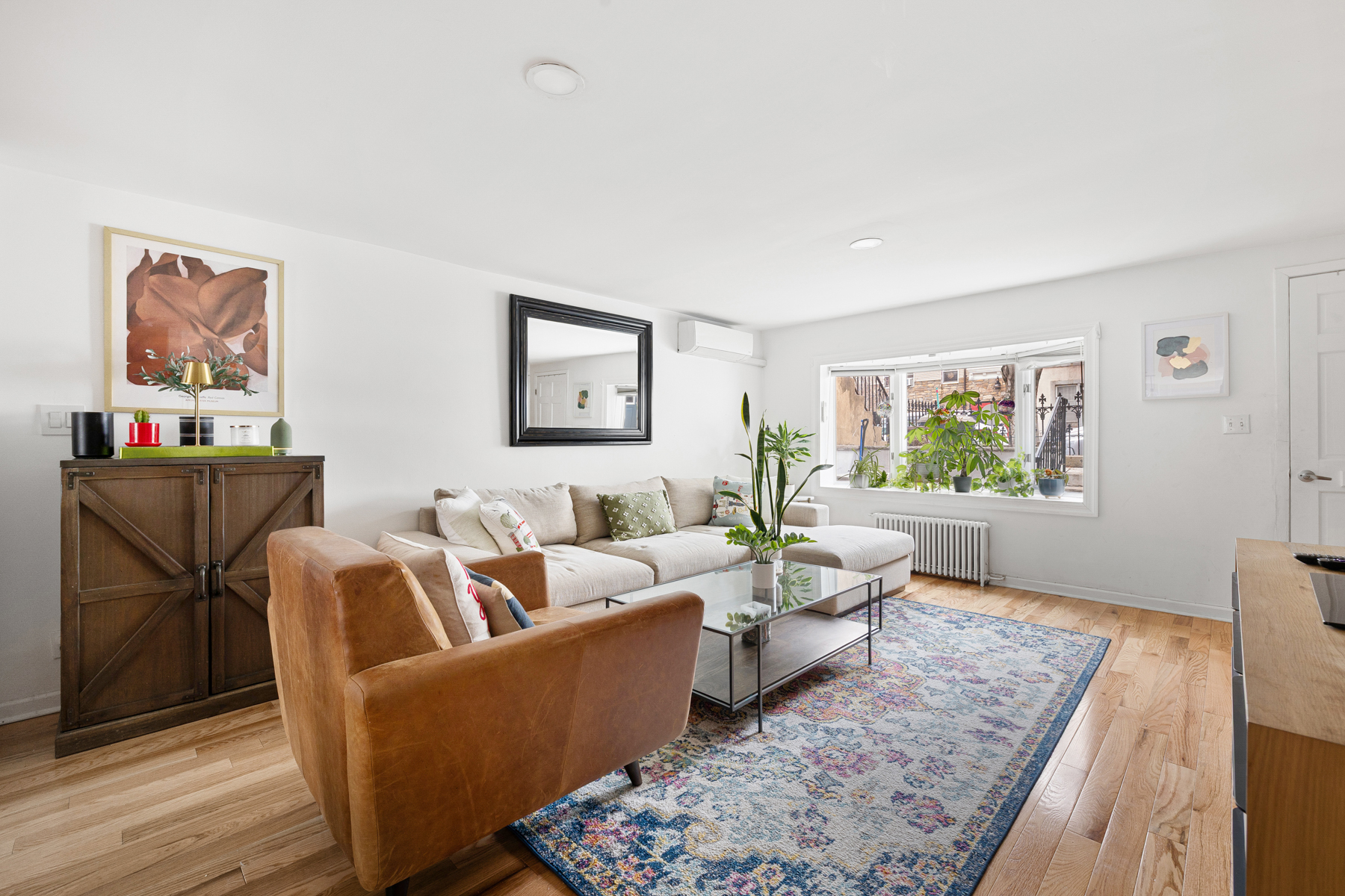 202 22nd Street Brooklyn, NY 11232 - Photo 4 of 28 a living room with furniture and a couch