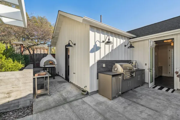 a front view of a house with swimming pool