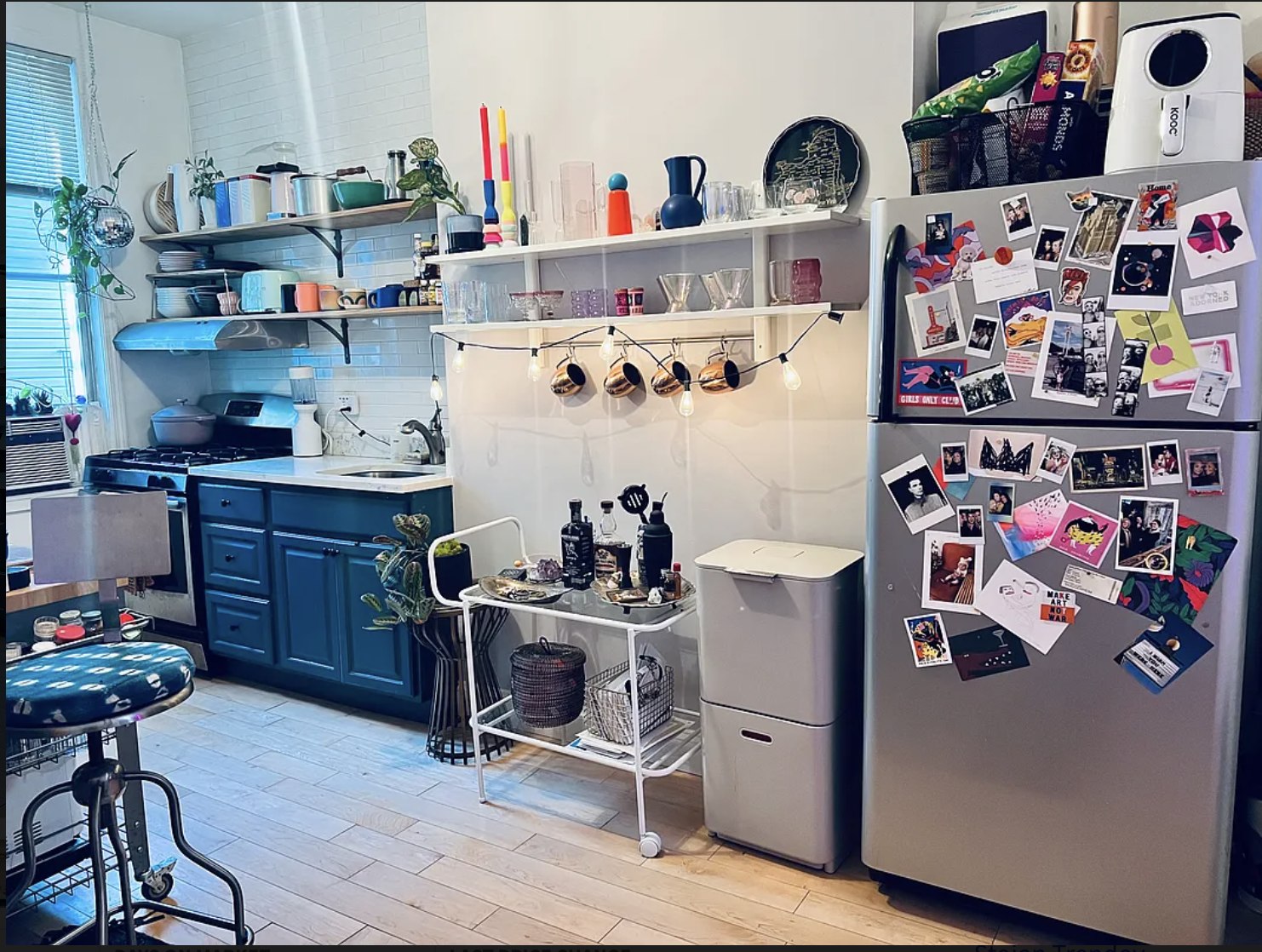283 Devoe Street, Unit 3R Brooklyn, NY 11211 - Photo 2 of 10 a view of kitchen with lots of wooden furniture