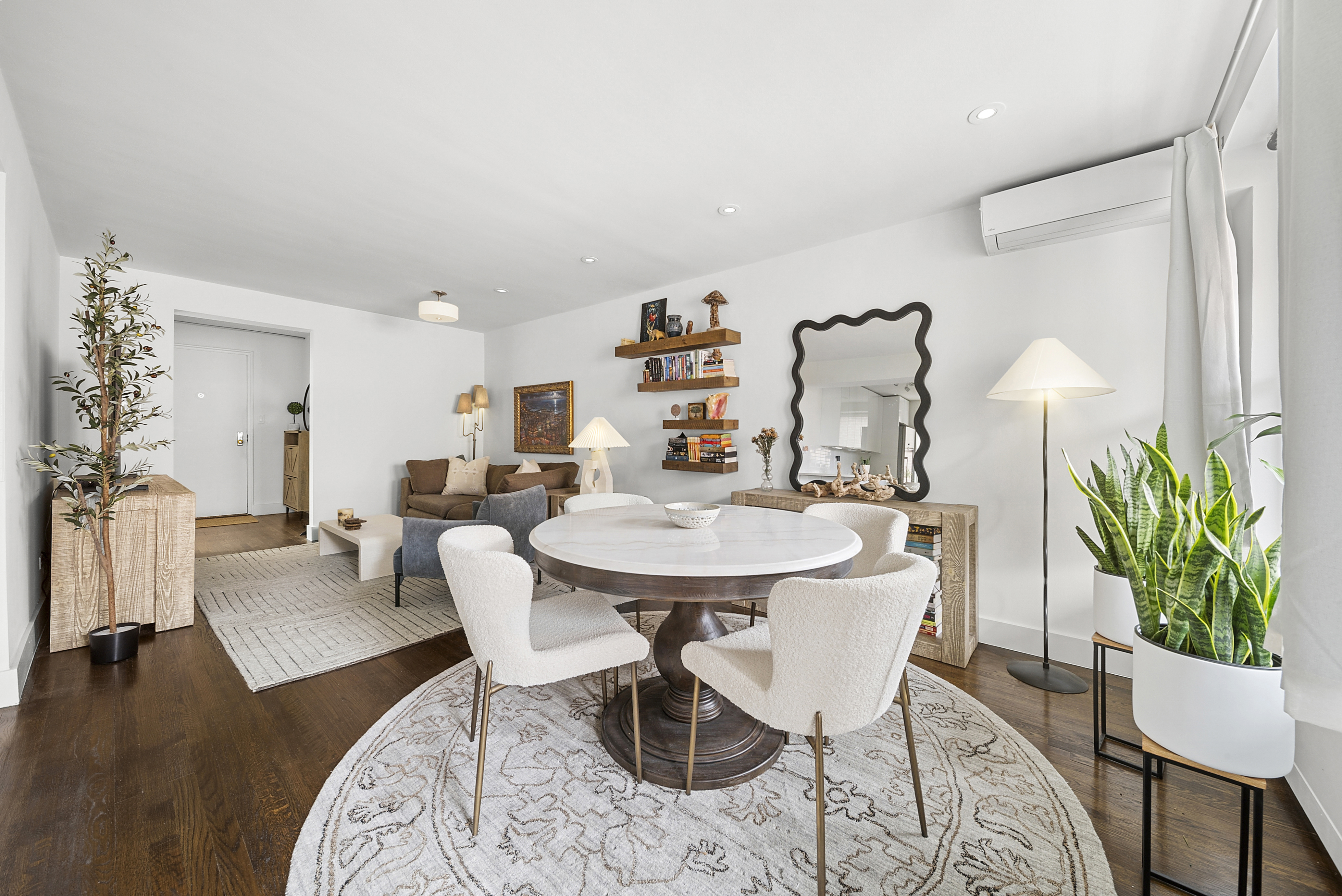 9511 Shore Road, Unit 505 Brooklyn, NY 11209 - Photo 5 of 18 a view of a dining room with furniture and wooden floor