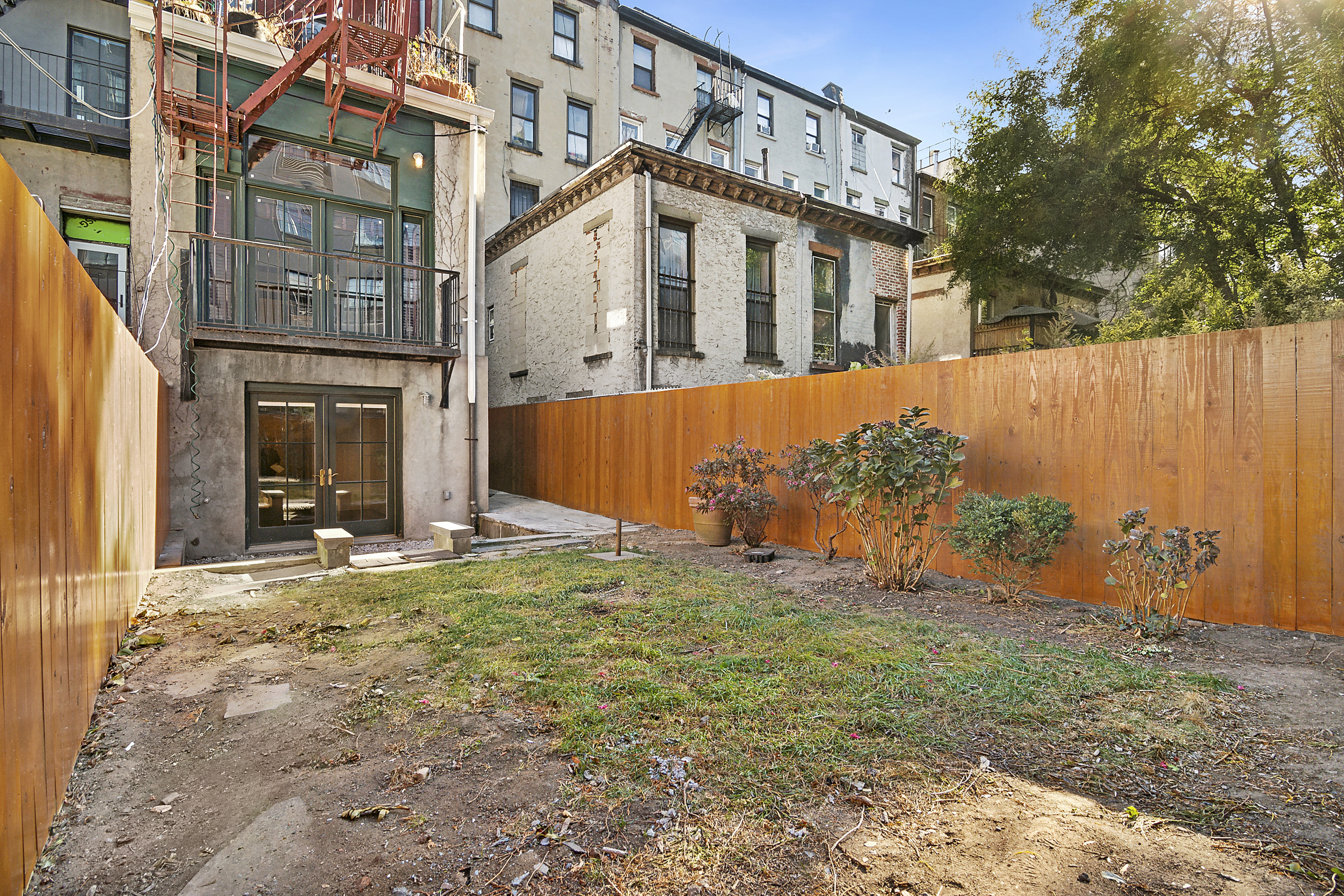 562 Washington Avenue, Unit 1 Brooklyn, NY 11238 - Photo 9 of 12 a front view of a house with a yard
