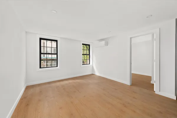 an empty room with windows