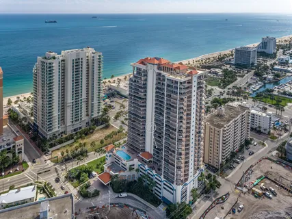 a view of a city with tall buildings