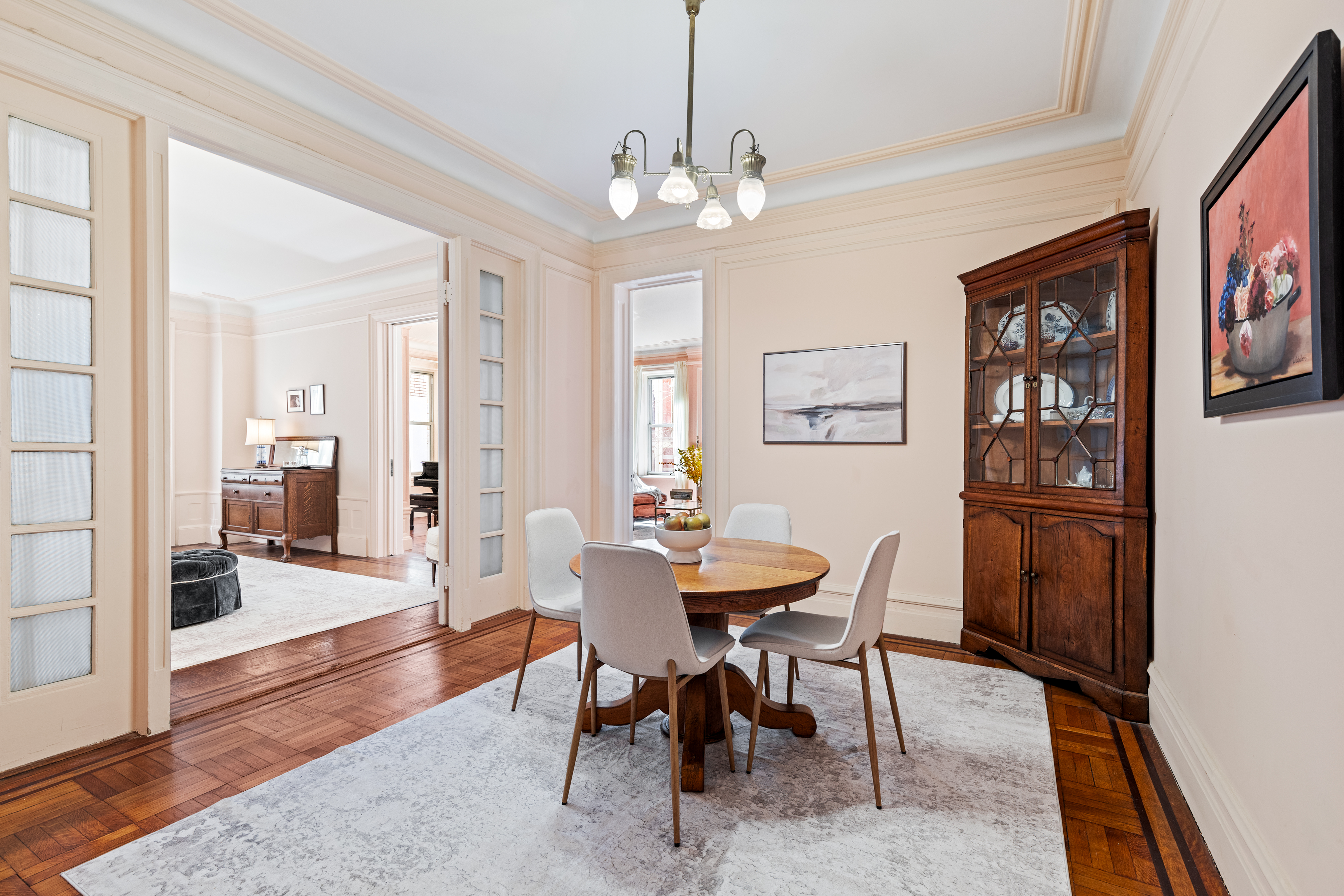 131 Riverside Drive, Unit 2C Manhattan, NY 10024 - Photo 6 of 17 a view of a dining room with furniture and wooden floor