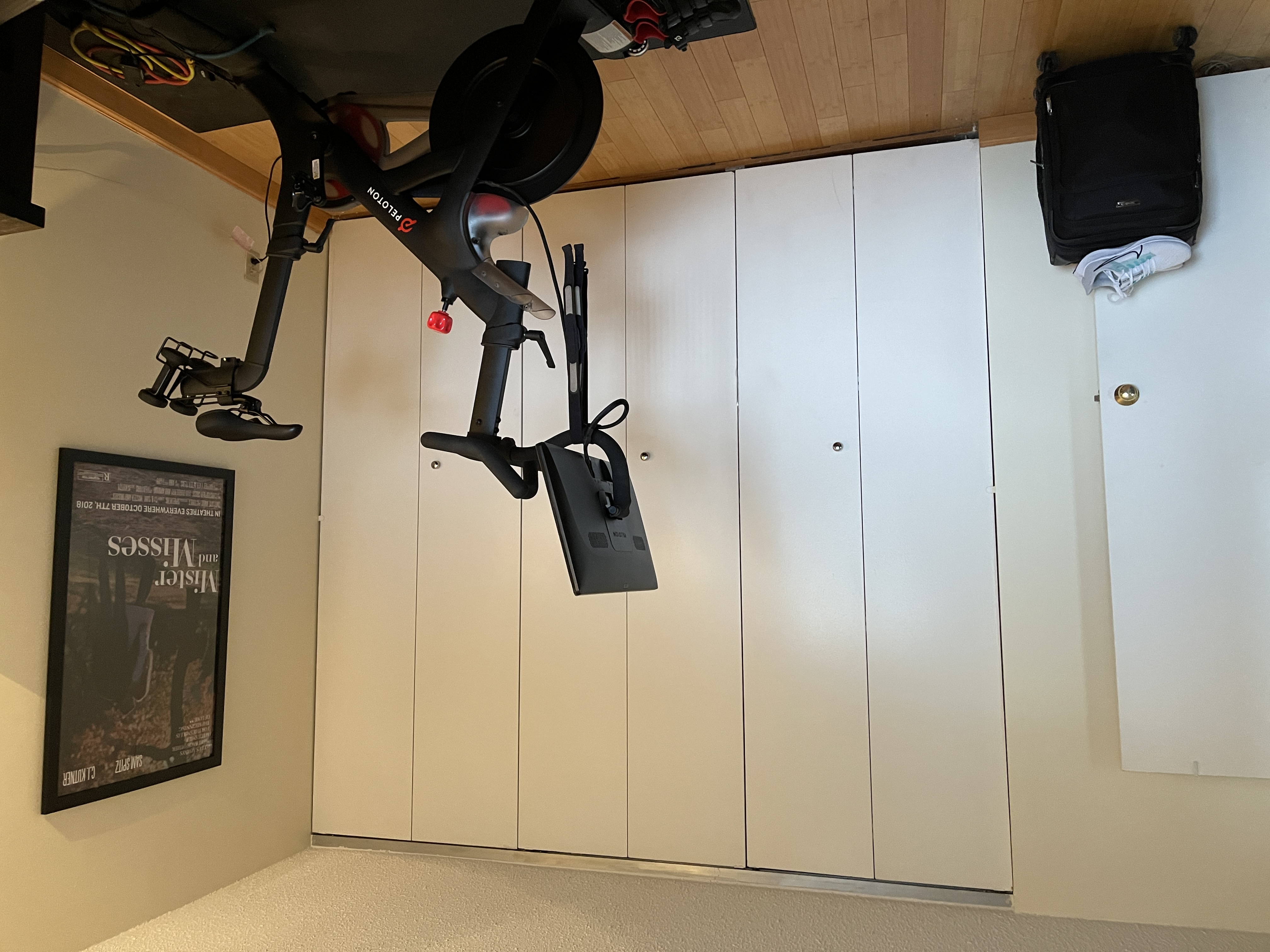 25-40 Shore Boulevard, Unit 5B Queens, NY 11102 - Photo 7 of 17 a room with gym equipment and wooden floor